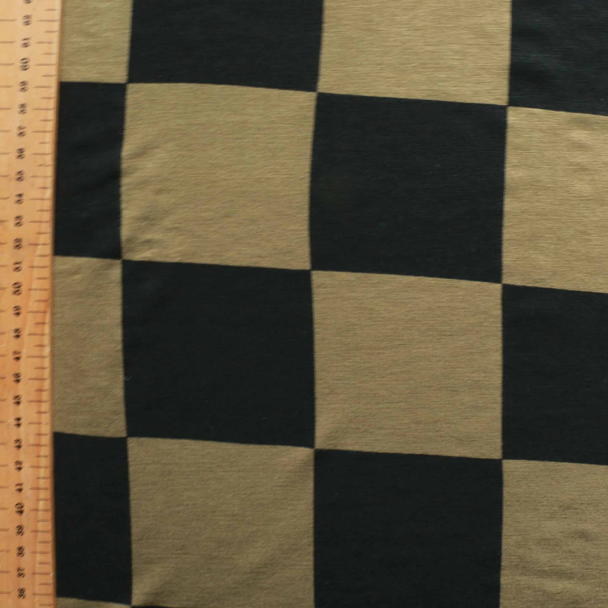 metre deadstock jersey in khaki green and black with large check design