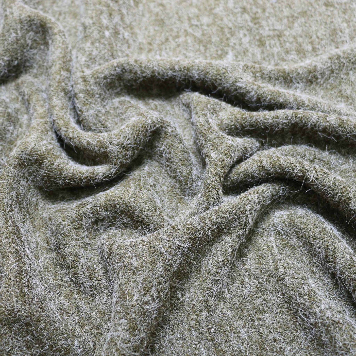 khaki green faux angora jersey knit dressmaking fabric