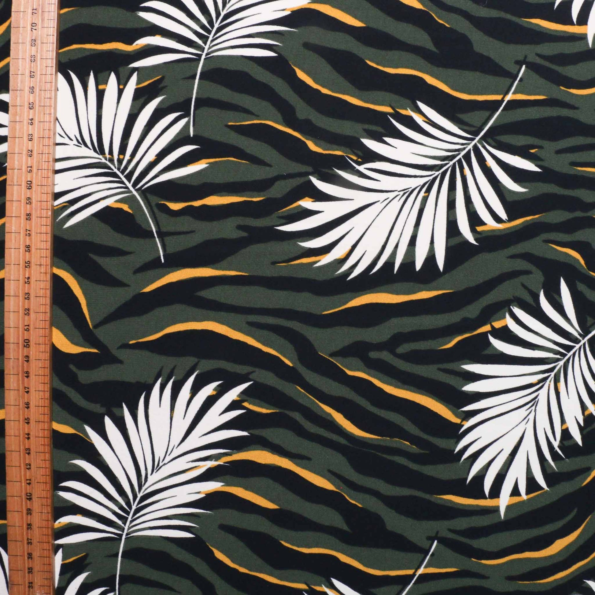 metre tropical zebra and leaf print challis dressmaking fabric in khaki and yellow
