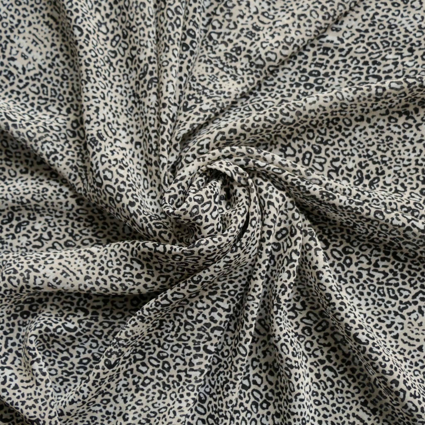 animal print leopard skin chiffon polyester synthetic dressmaking fabric