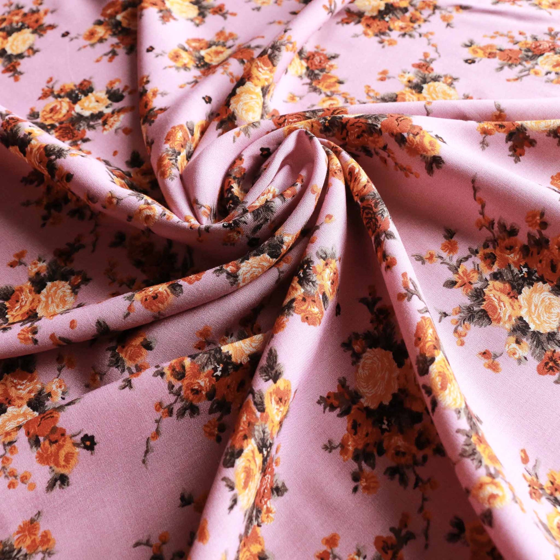 lilac viscose challis dressmaking rayon fabric with orange and yellow floral printed flower design