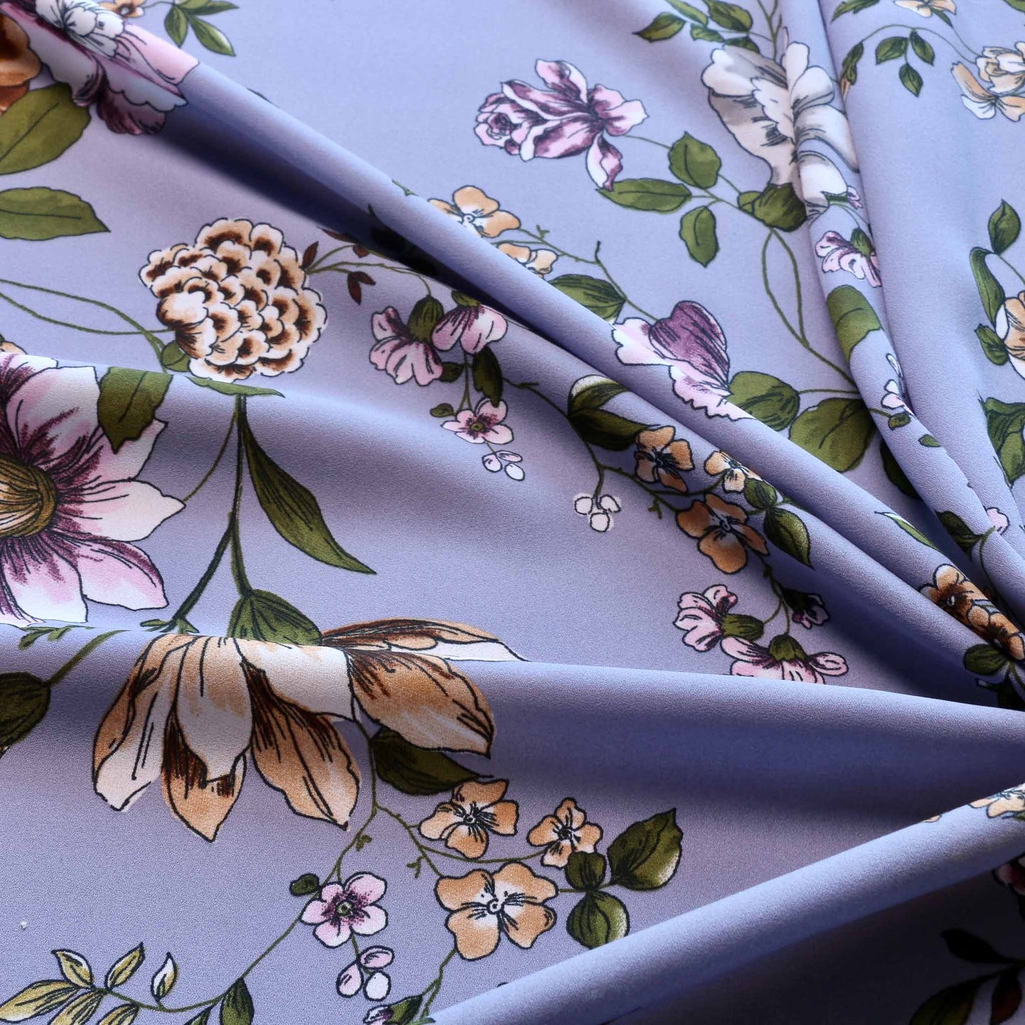 lilac georgette dressmaking fabric with pastel floral print