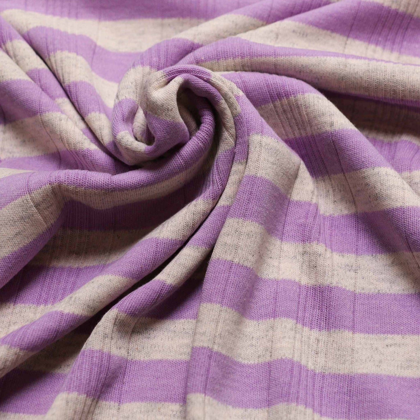 lilac striped jersey on grey fabric for dressmaking