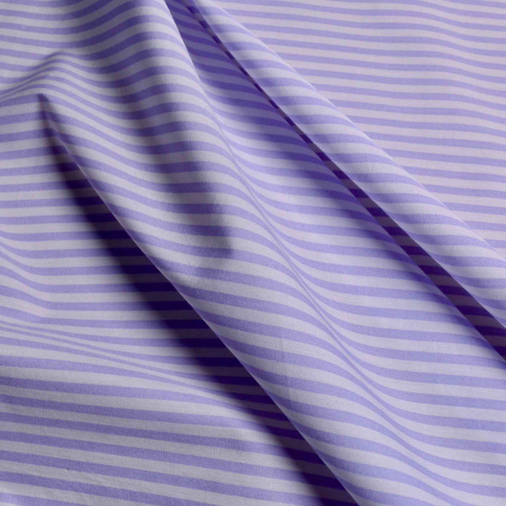 stripe patterned cotton poplin fabric in pale lilac colour