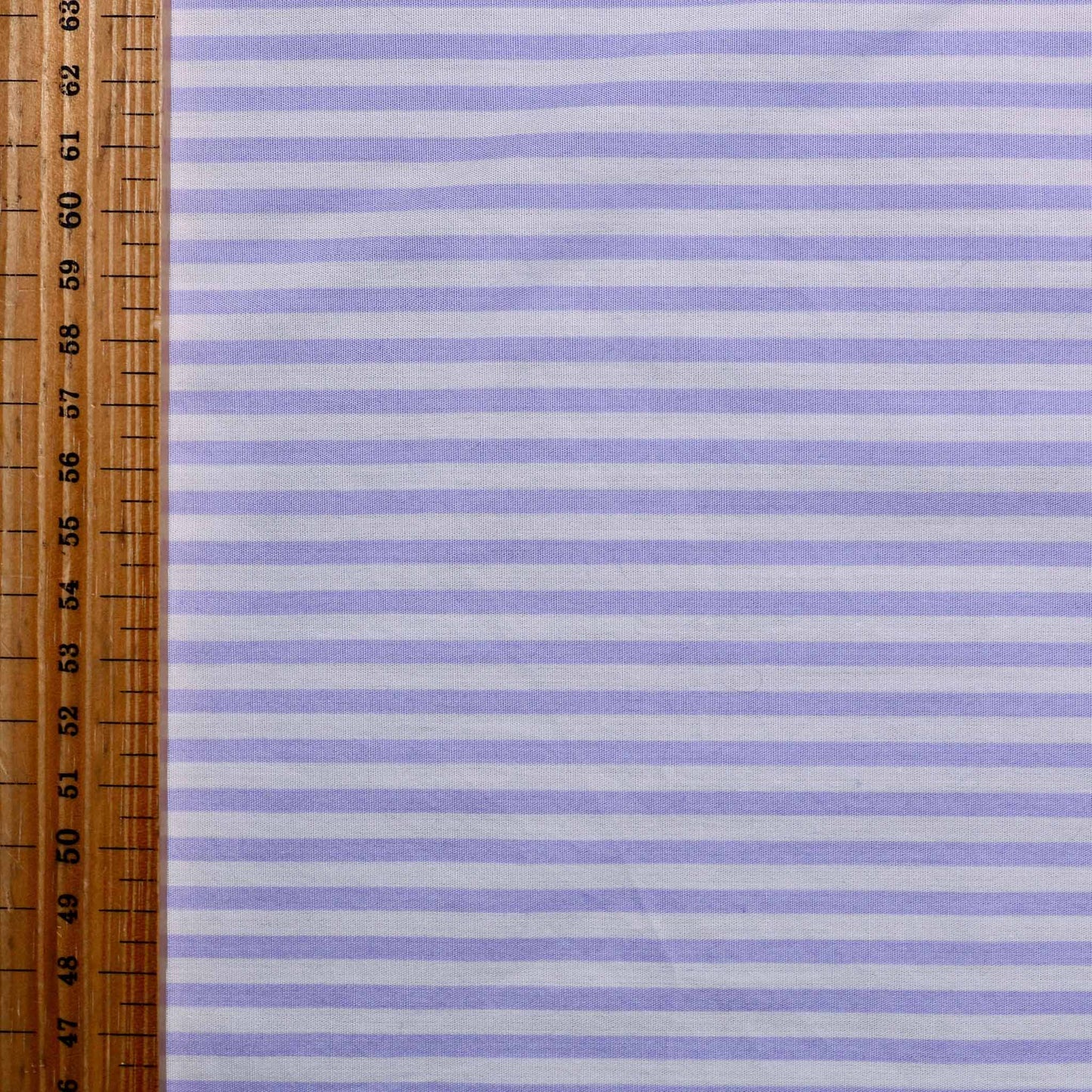 metre lilac cotton poplin dressmaking fabric with stripes pattern