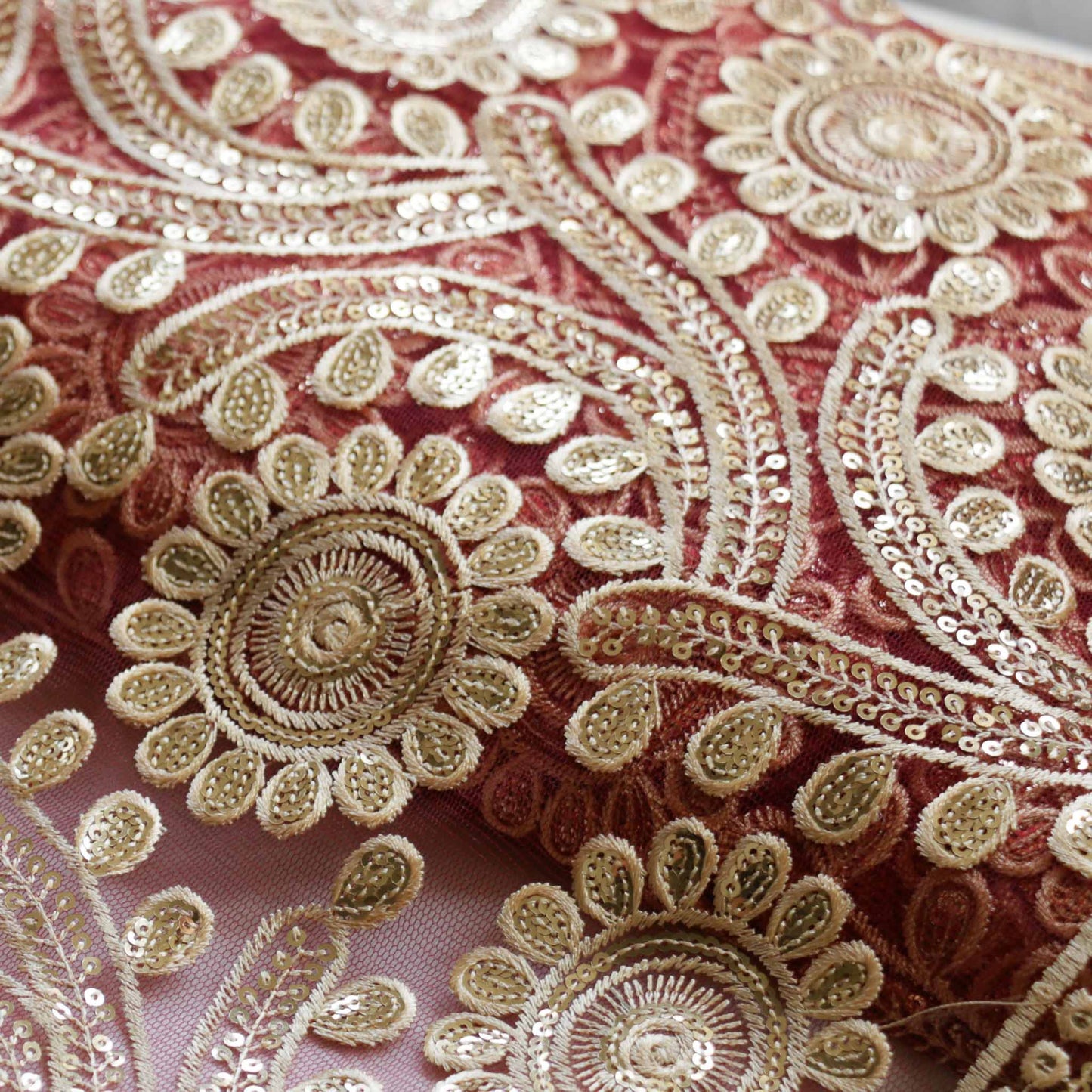 gold embroidery on maroon tulle Indian inspired dressmaking fabric