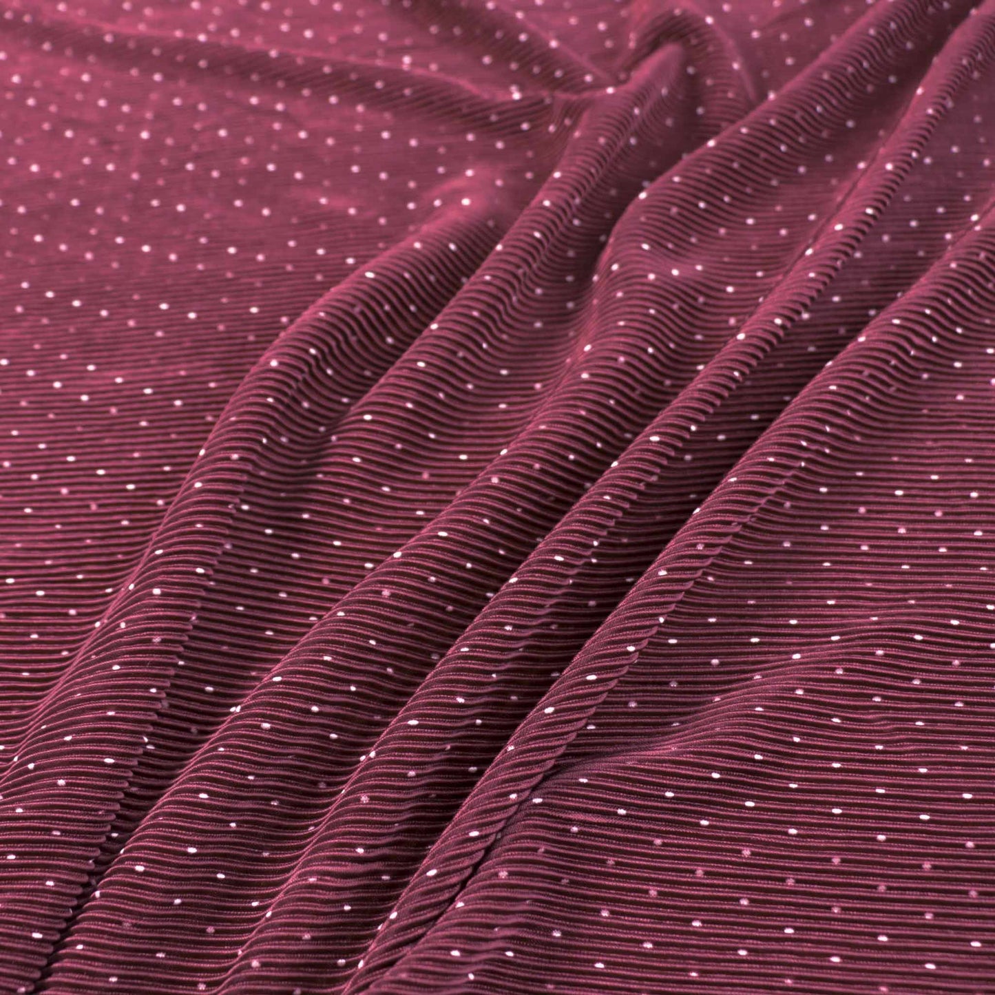 maroon plisse pleated dressmaking fabric with this polka dot pattern