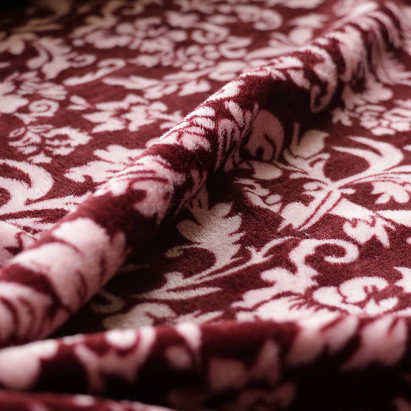 maroon fleece dressmaking fabric with floral print