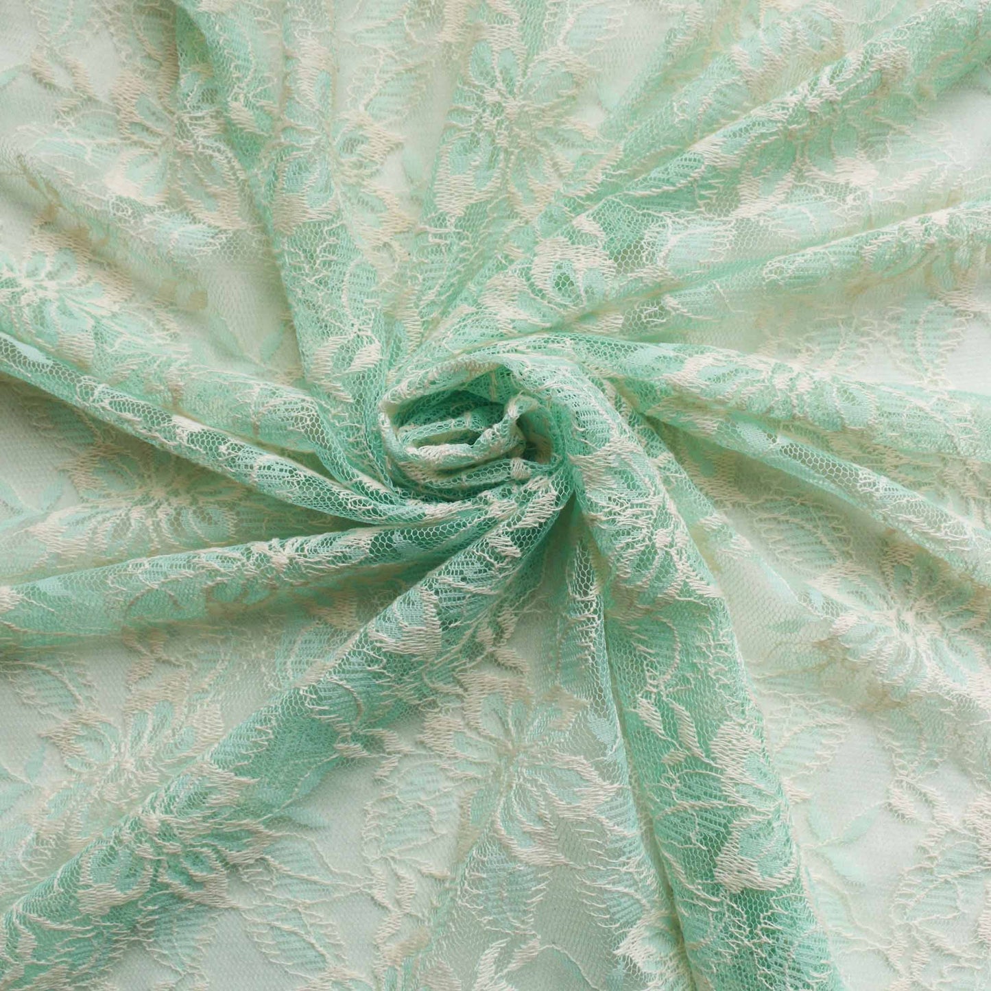 delicate floral mint green and cream lace fabric for dressmaking