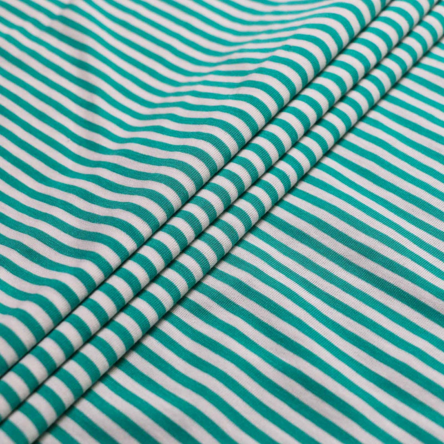 cloth controls mint and white stripe jersey dressmaking fabric