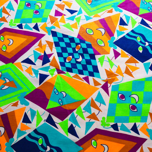 retro cotton dressmaking fabric with multicoloured kites print