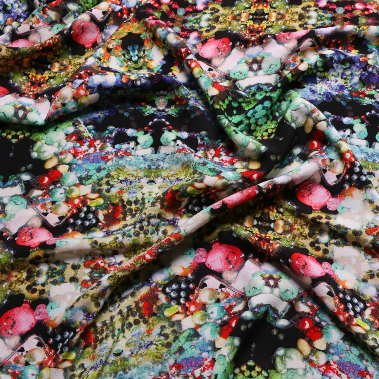 multicoloured abstract jewellery on black viscose challis fabric