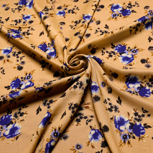 mustard coloured viscose challis dressmaking fabric with floral print