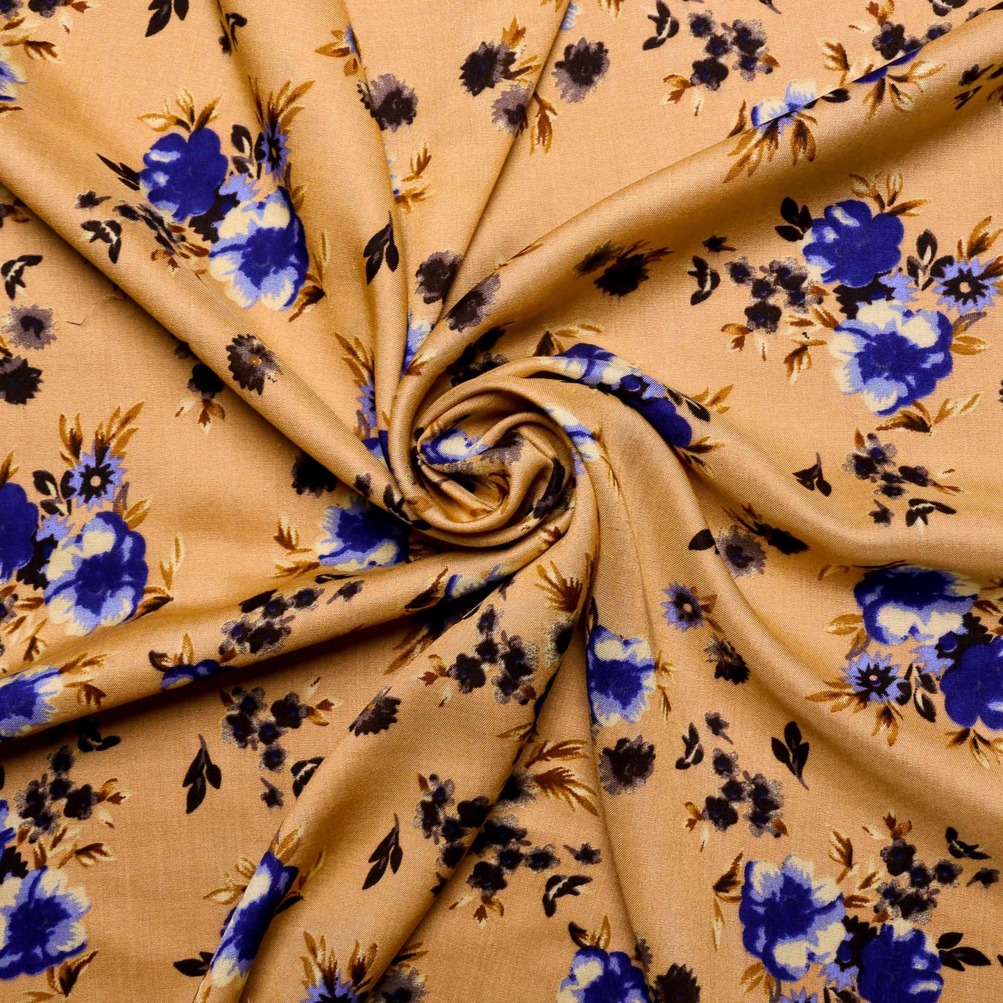 viscose challis dressmaking fabric with blue flowers on mustard base
