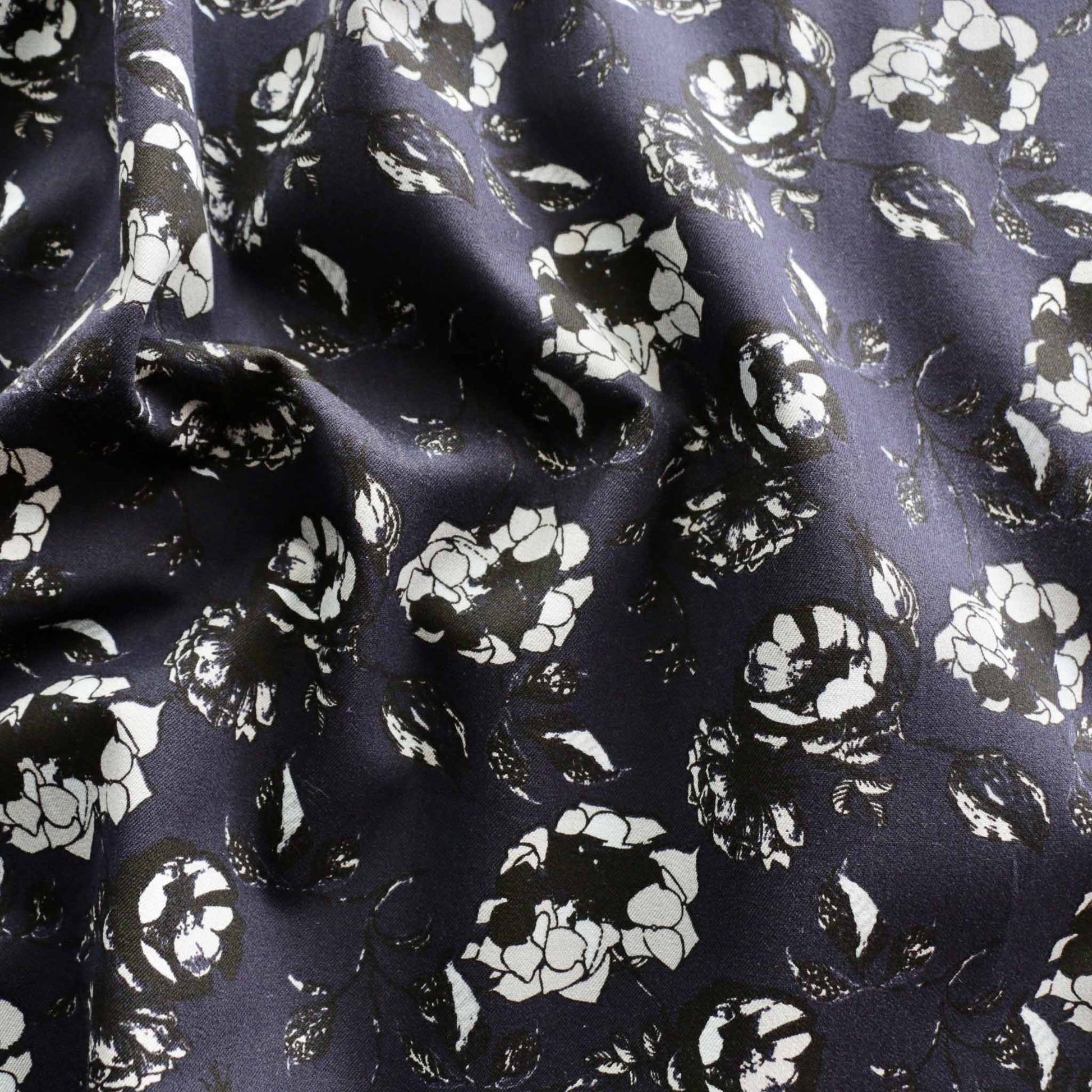 white and black floral print on navy blue cotton sateen dress fabric
