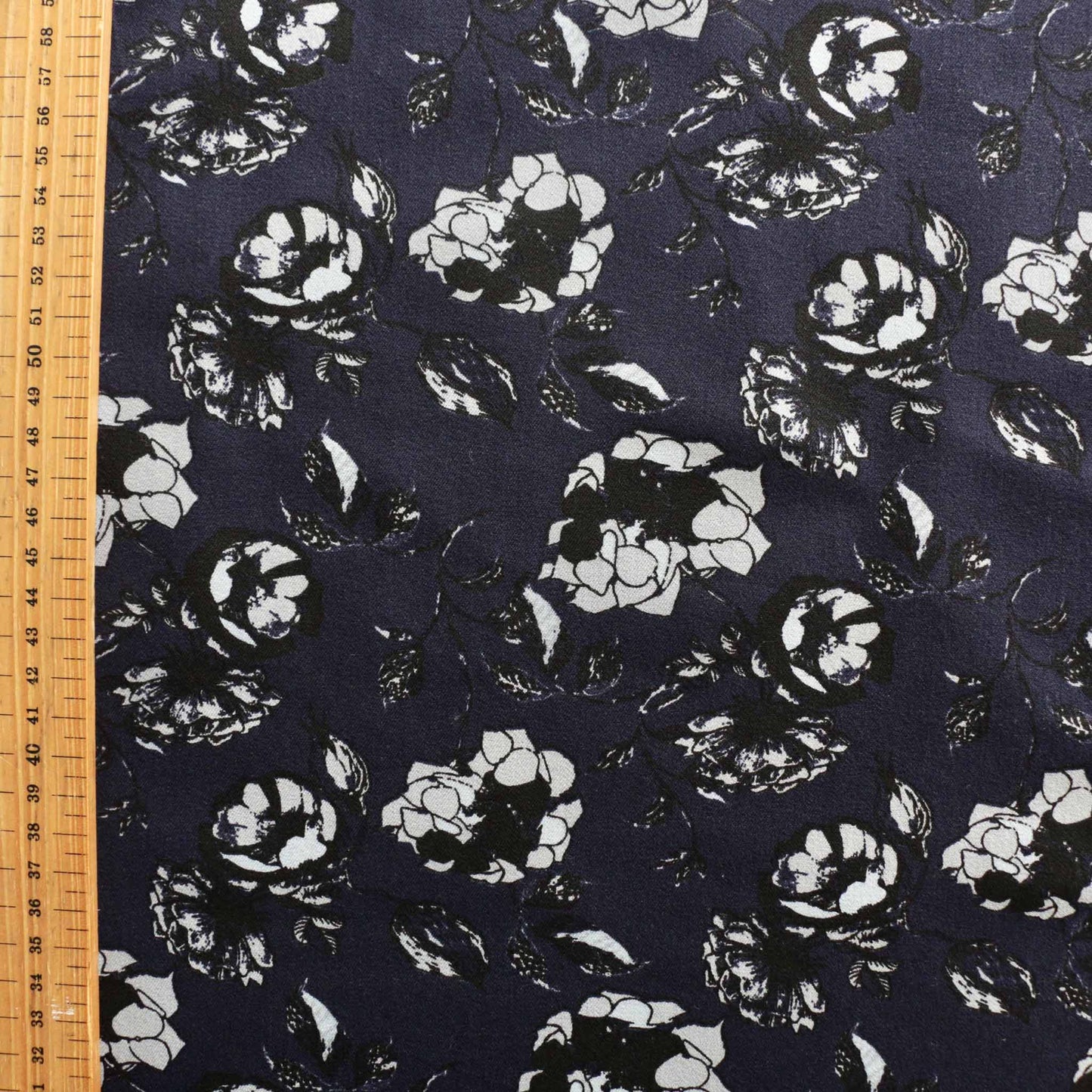 metre cotton sateen in navy blue fabric with floral white printed flowers