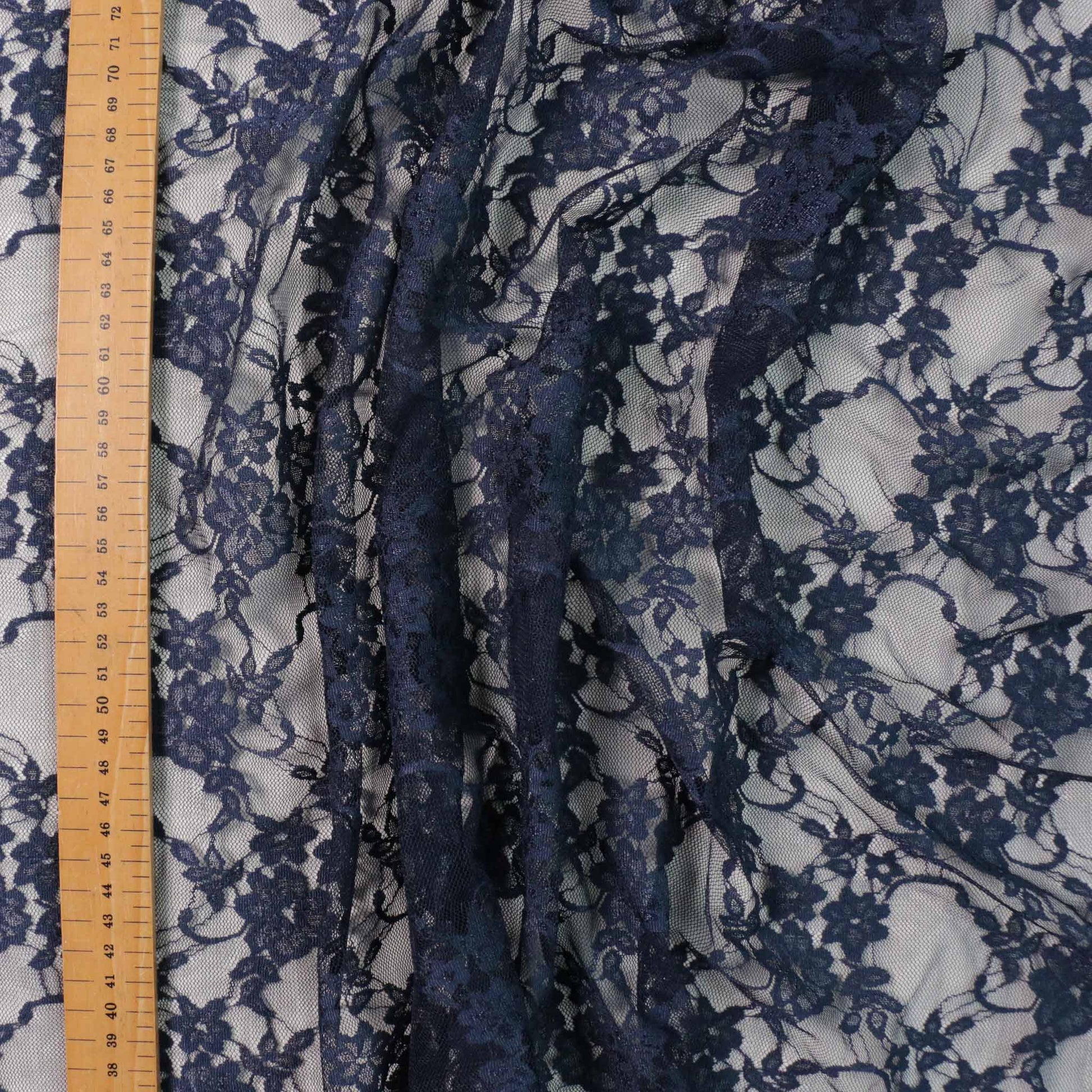 metre lace fabric with floral design in navy blue colour