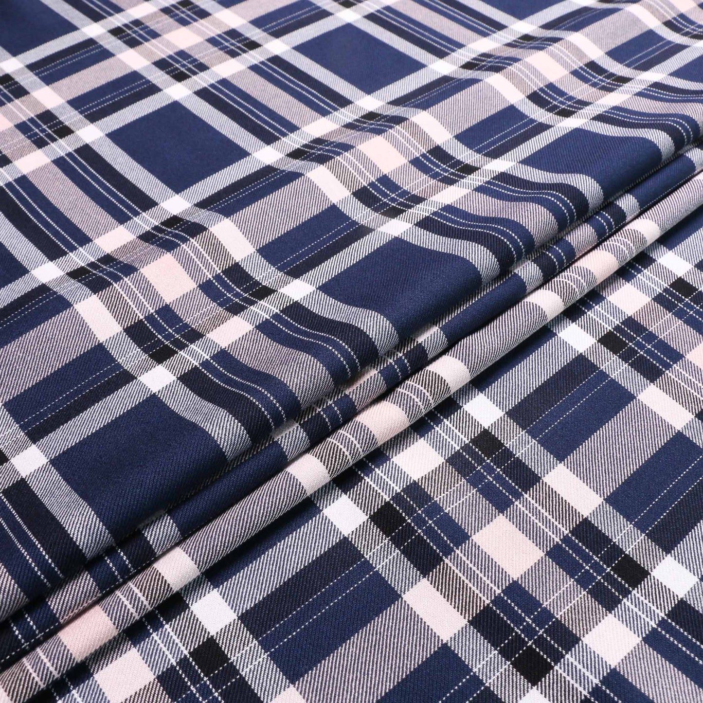 navy blue viscose twill dressmaking rayon fabric with large white pink check design