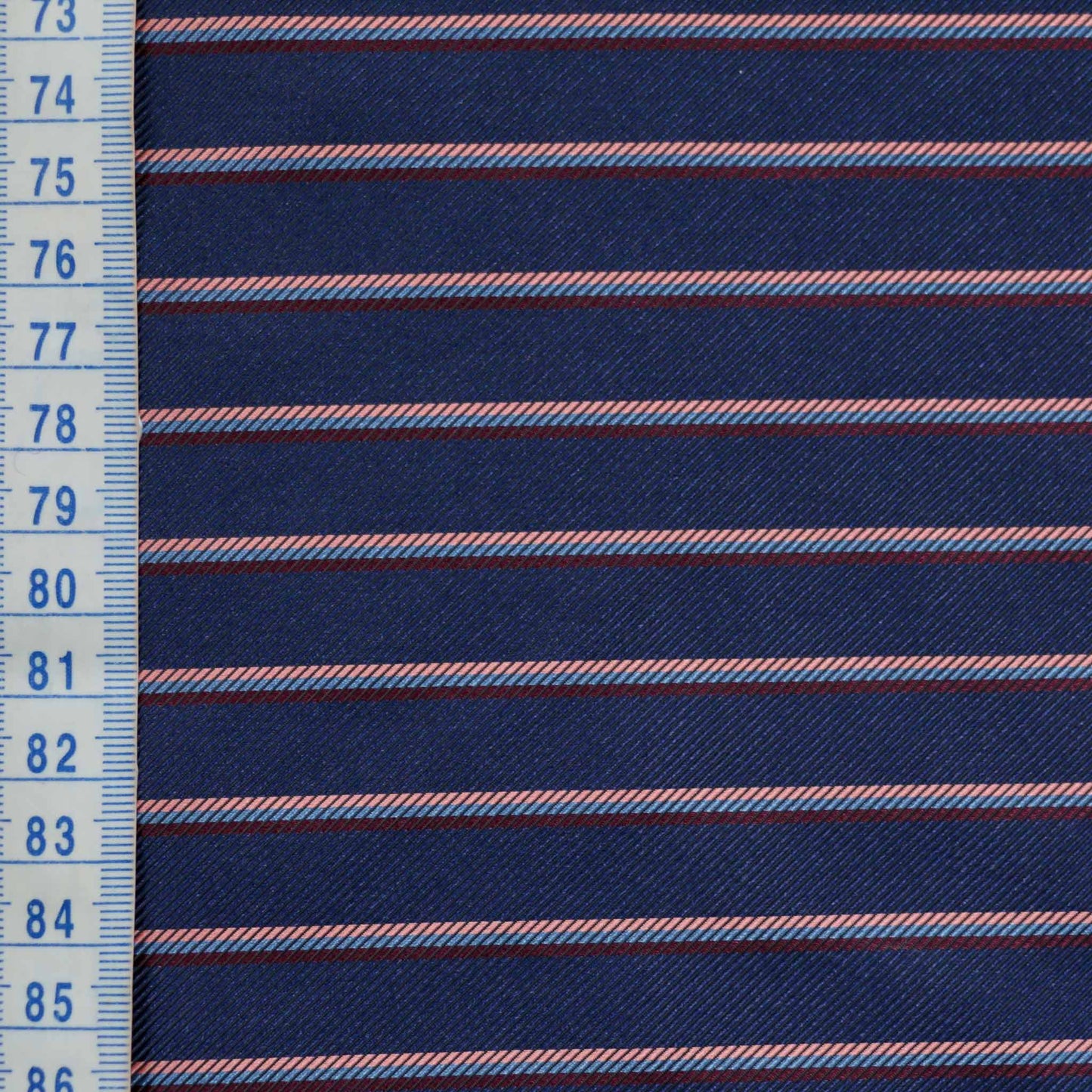 metre twill lining viscose dressmaking lining fabric in navy with pink and maroon striped design