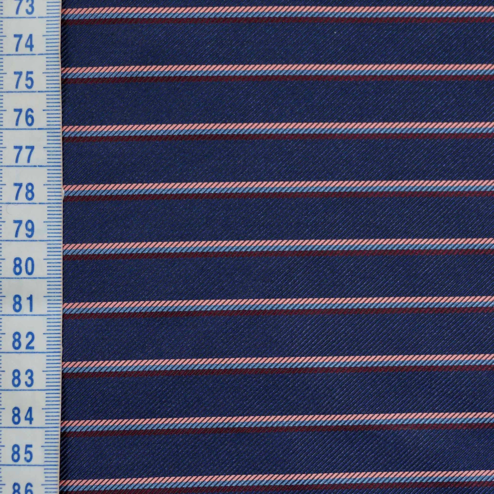 metre twill lining viscose dressmaking lining fabric in navy with pink and maroon striped design