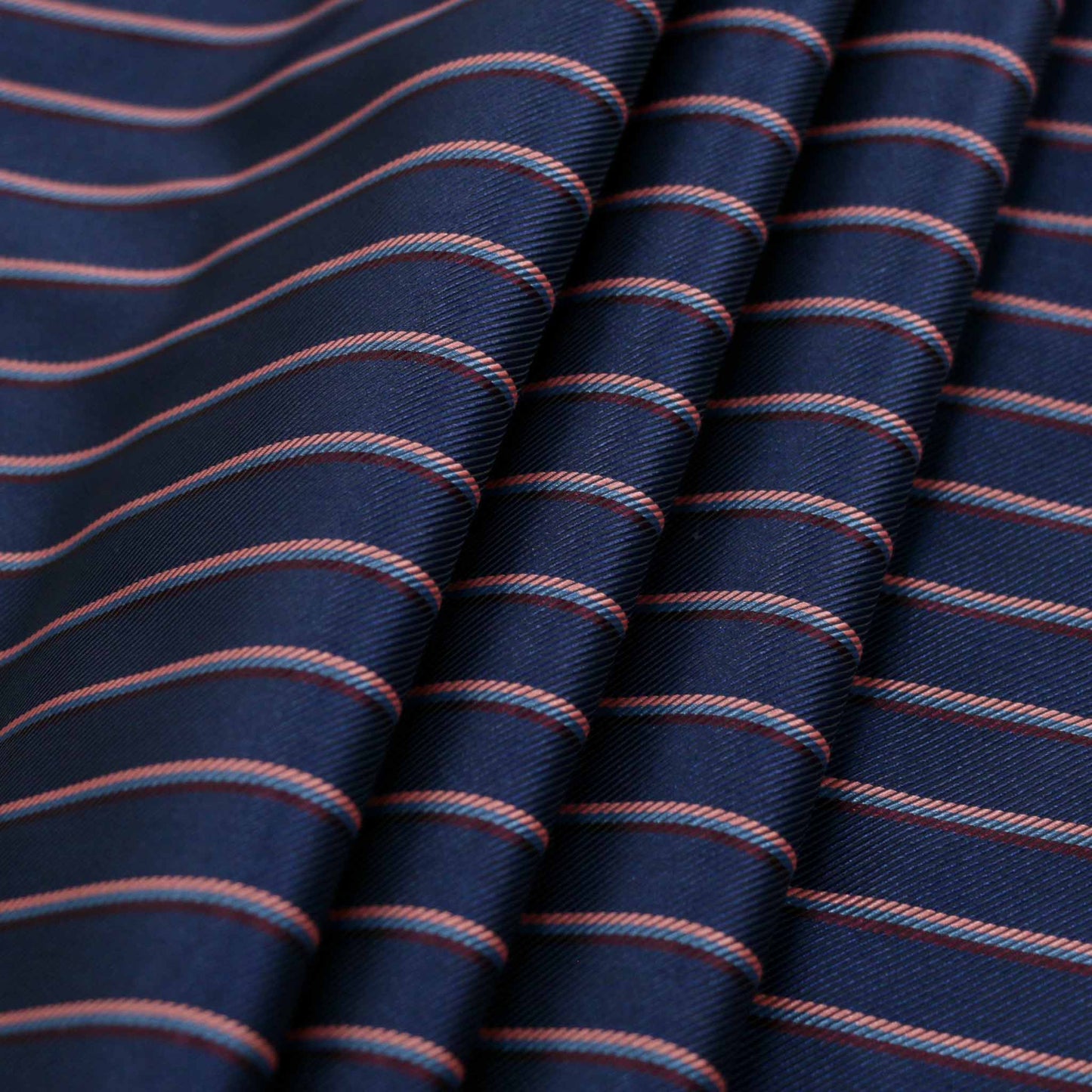 navy twill viscose lining dressmaking fabric with pink and maroon pinstripe design