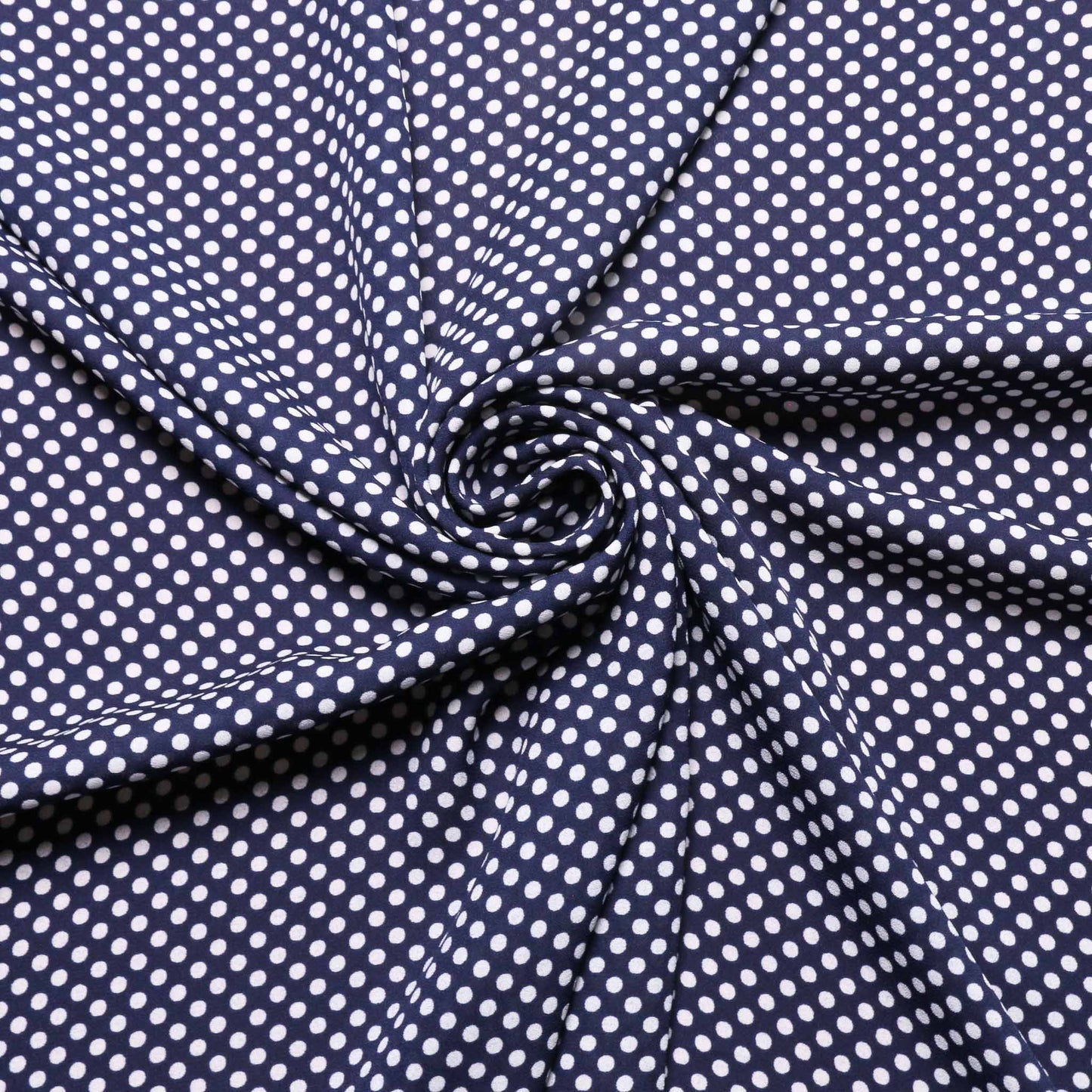 navy and white georgette dressmaking fabric with polka dot design uk fabric sales