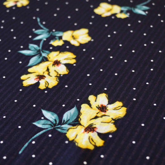 navy blue georgette dressmaking fabric with yellow flower print