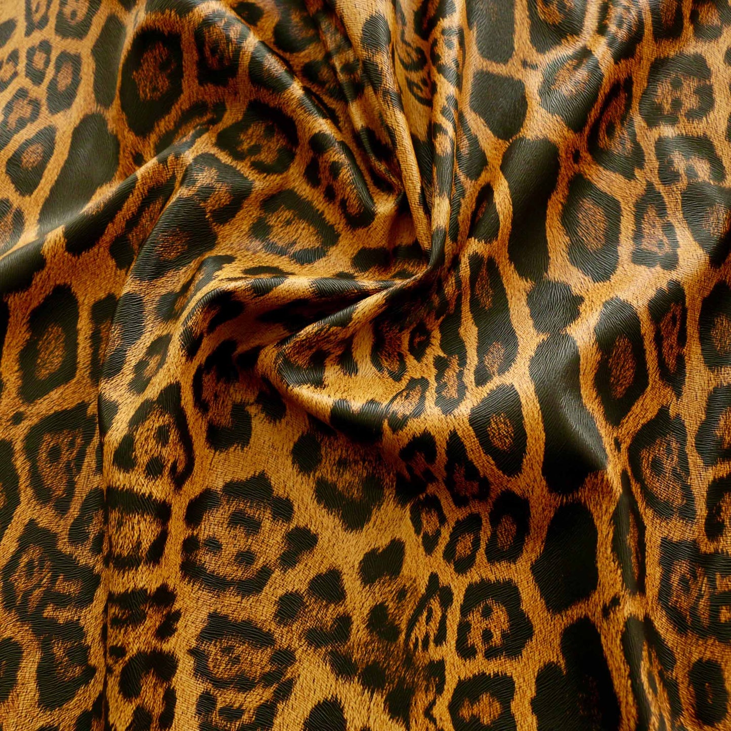 jaguar skin vinyl pvc dressmaking fabric 