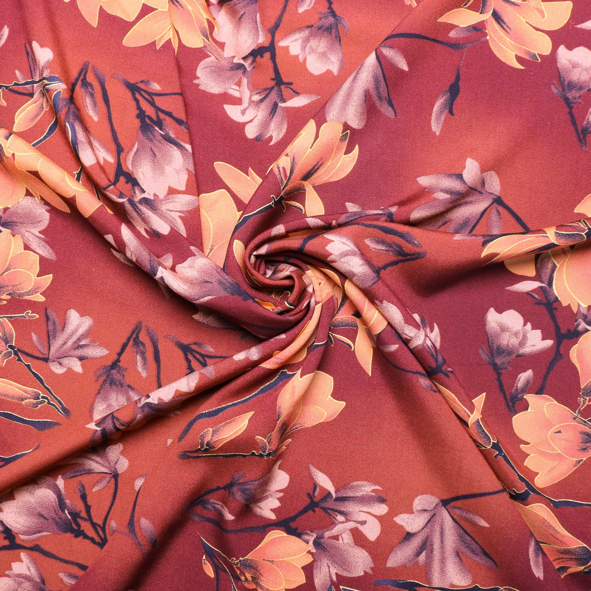 burnt orange viscose challis dress fabric with flower print