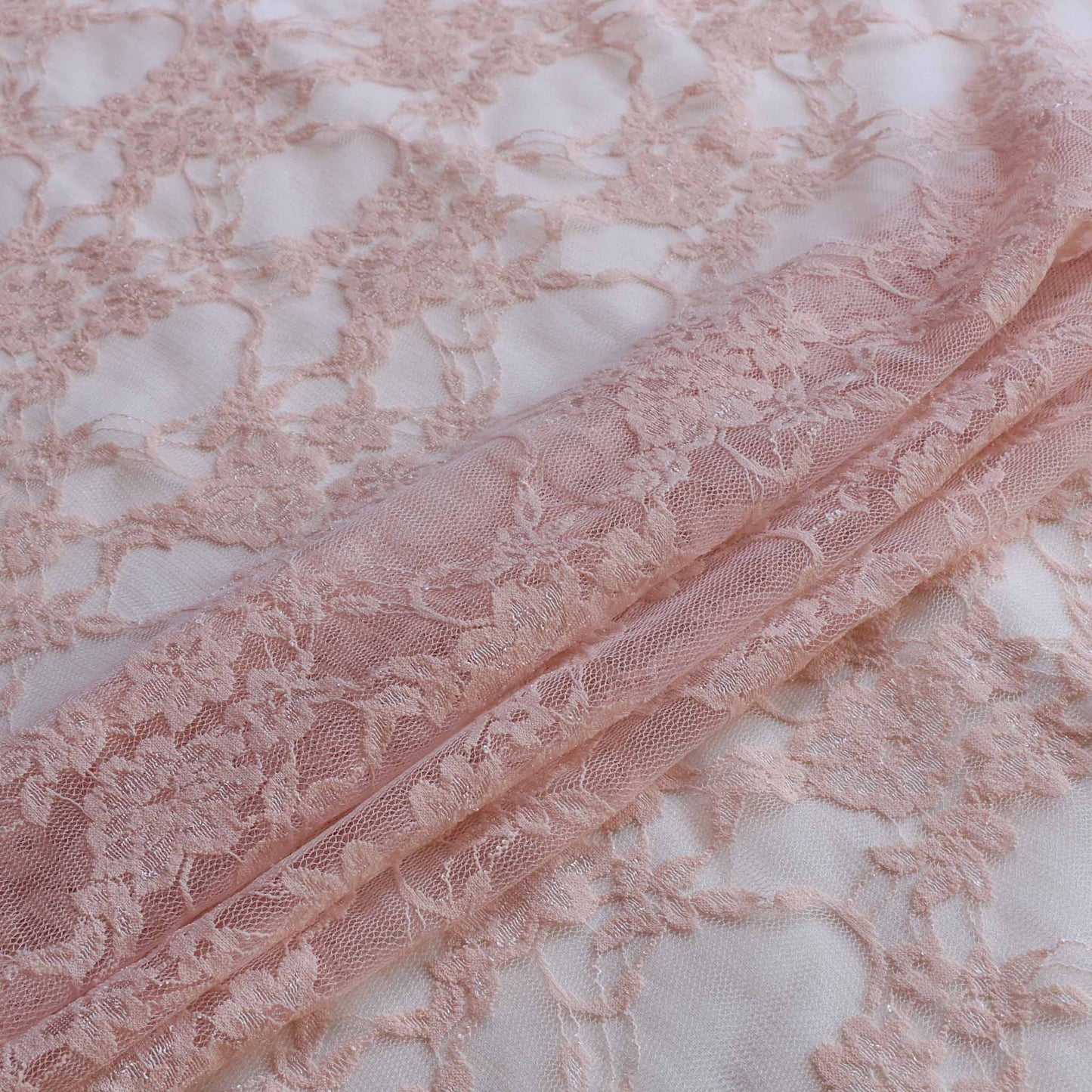 peach stretchy floral lace dressmaking fabric