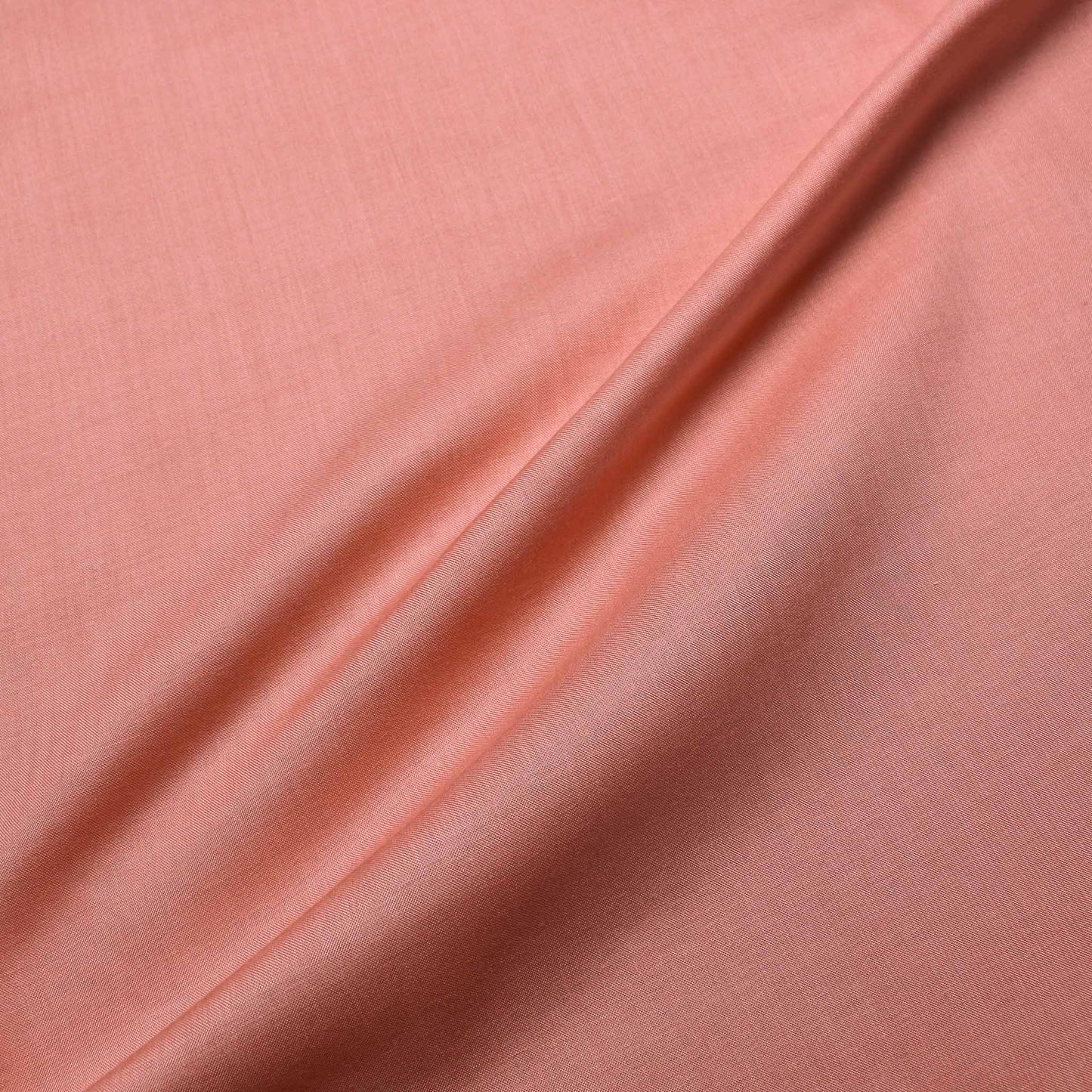 viscose challis dressmaking fabric plain peach colour