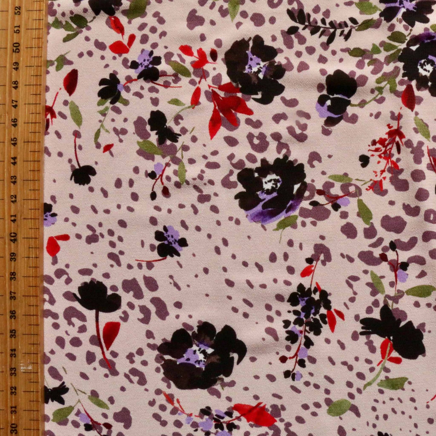 metre pink chiffon viscose dressmaking fabric with black flowers and brown animal print