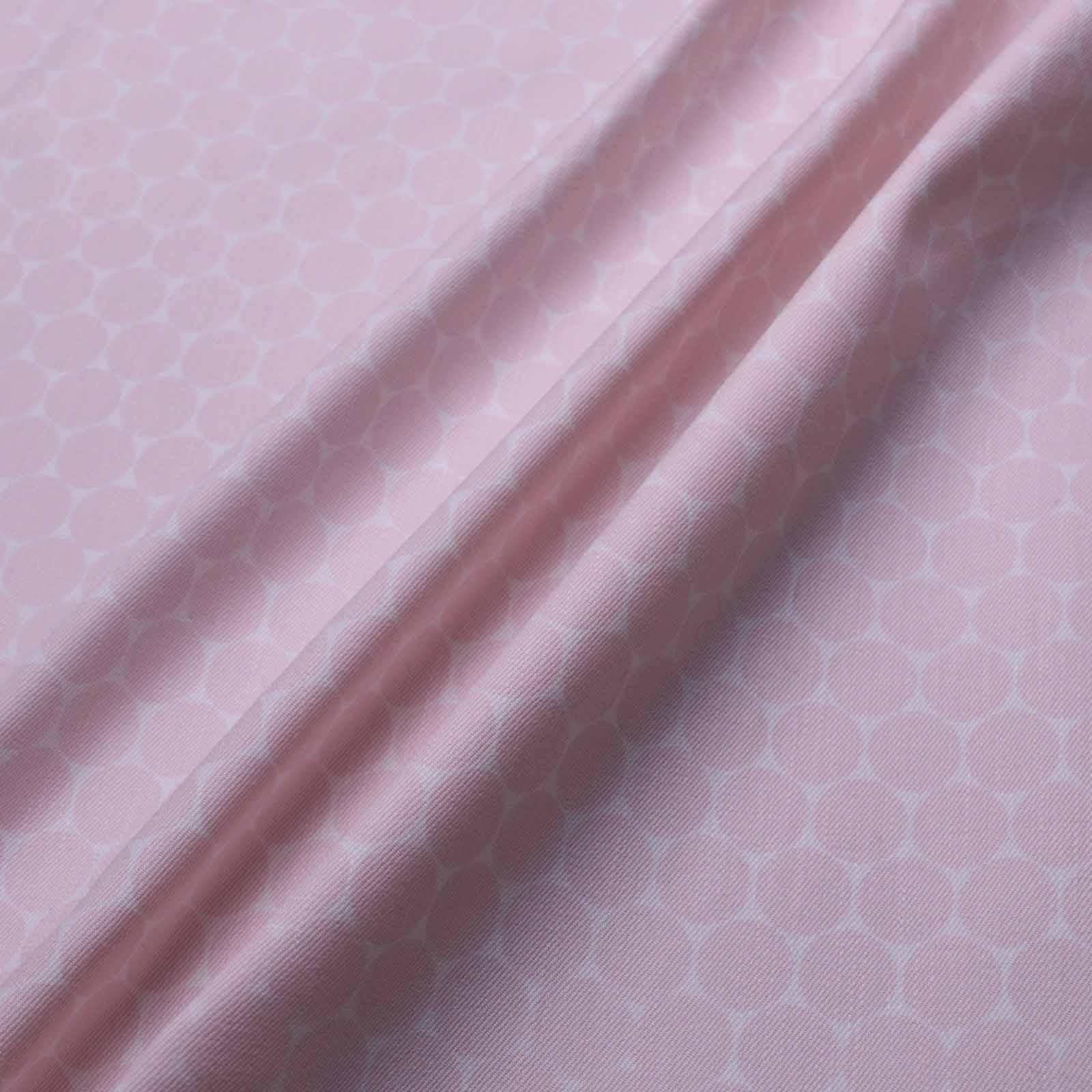 stretchy cotton twill dressmaking fabric with pink and white dot design
