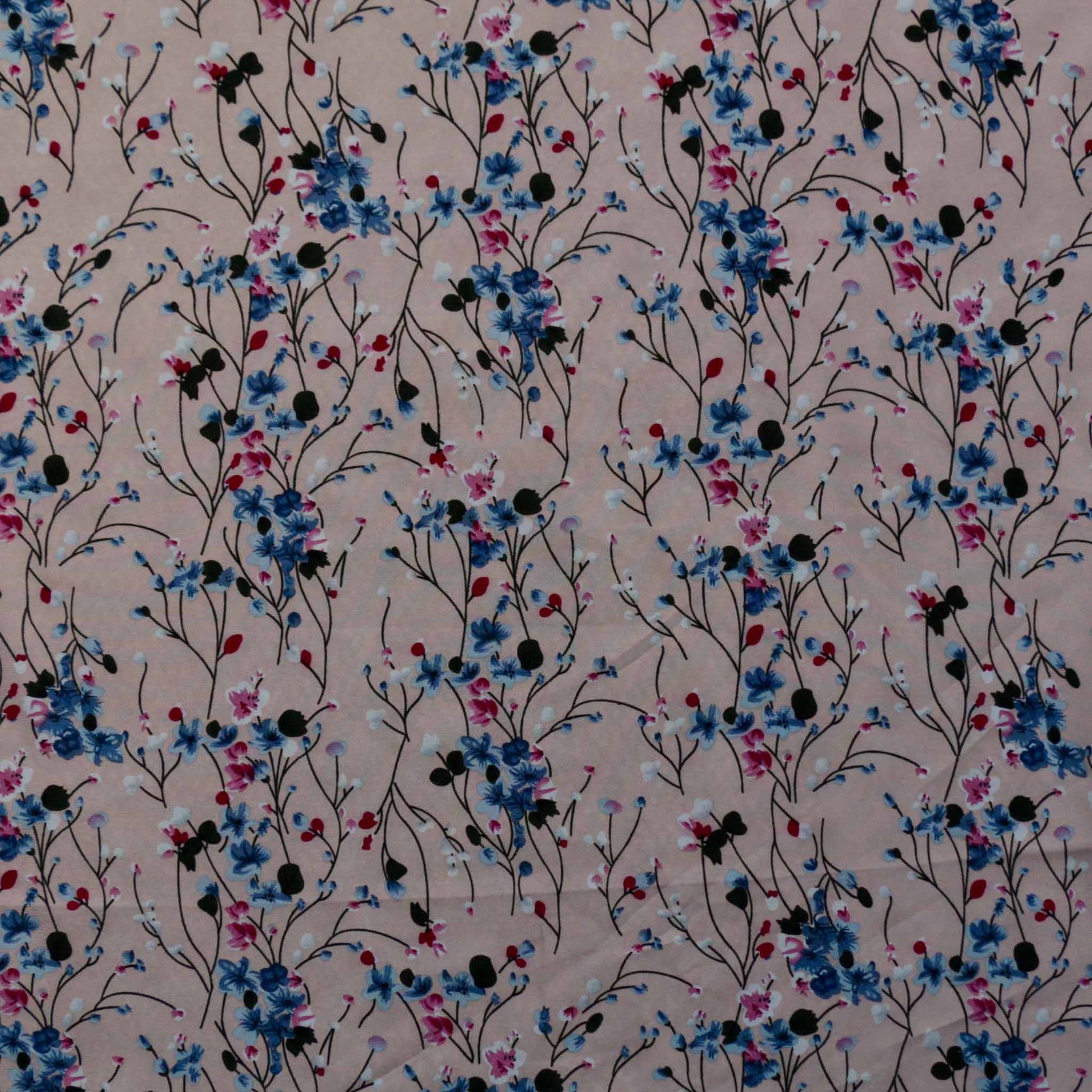 stretchy pink chiffon floral dressmaking fabric with blue flowers