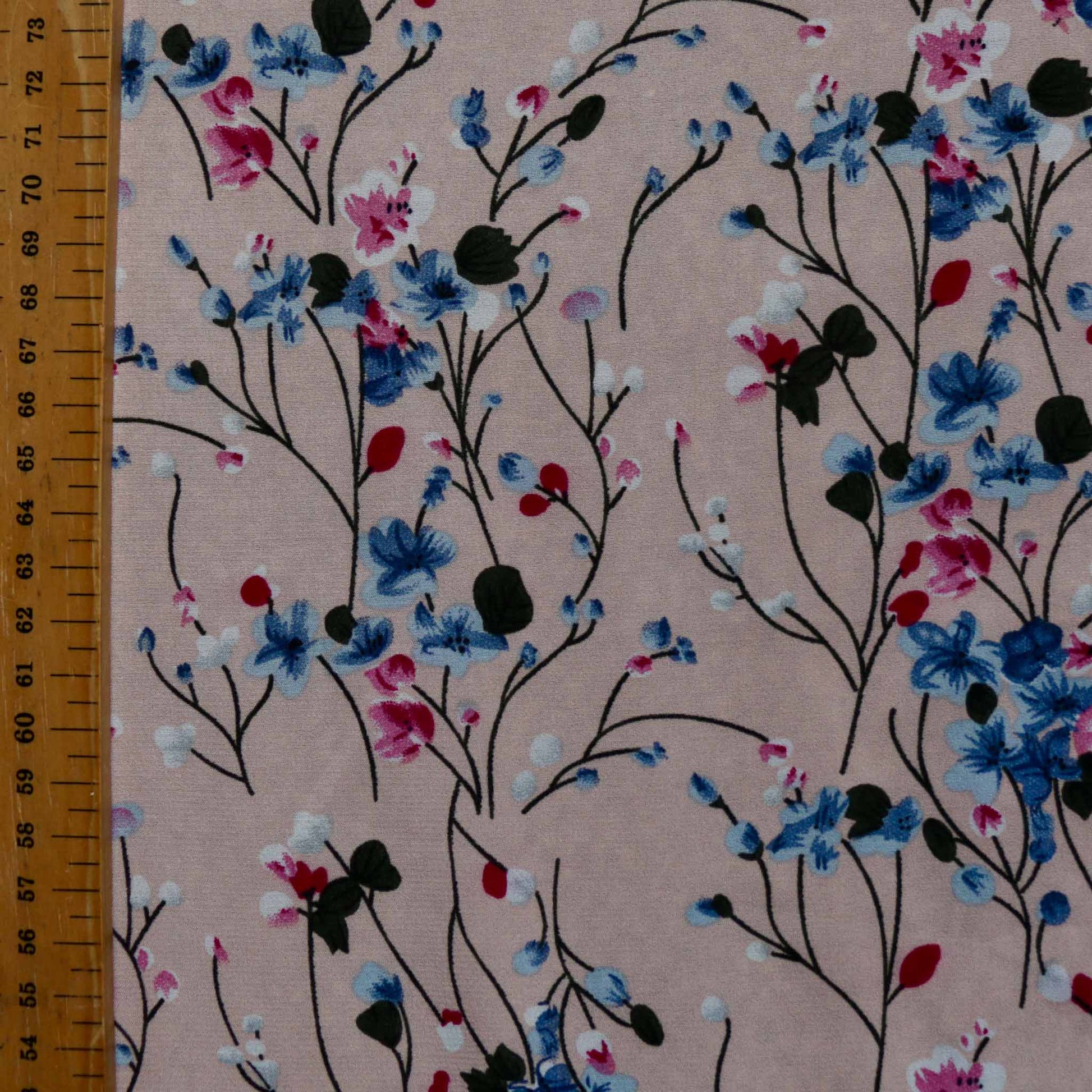 metre chiffon stretchy polyester dressmaking fabric in pink with blue and white floral flower print