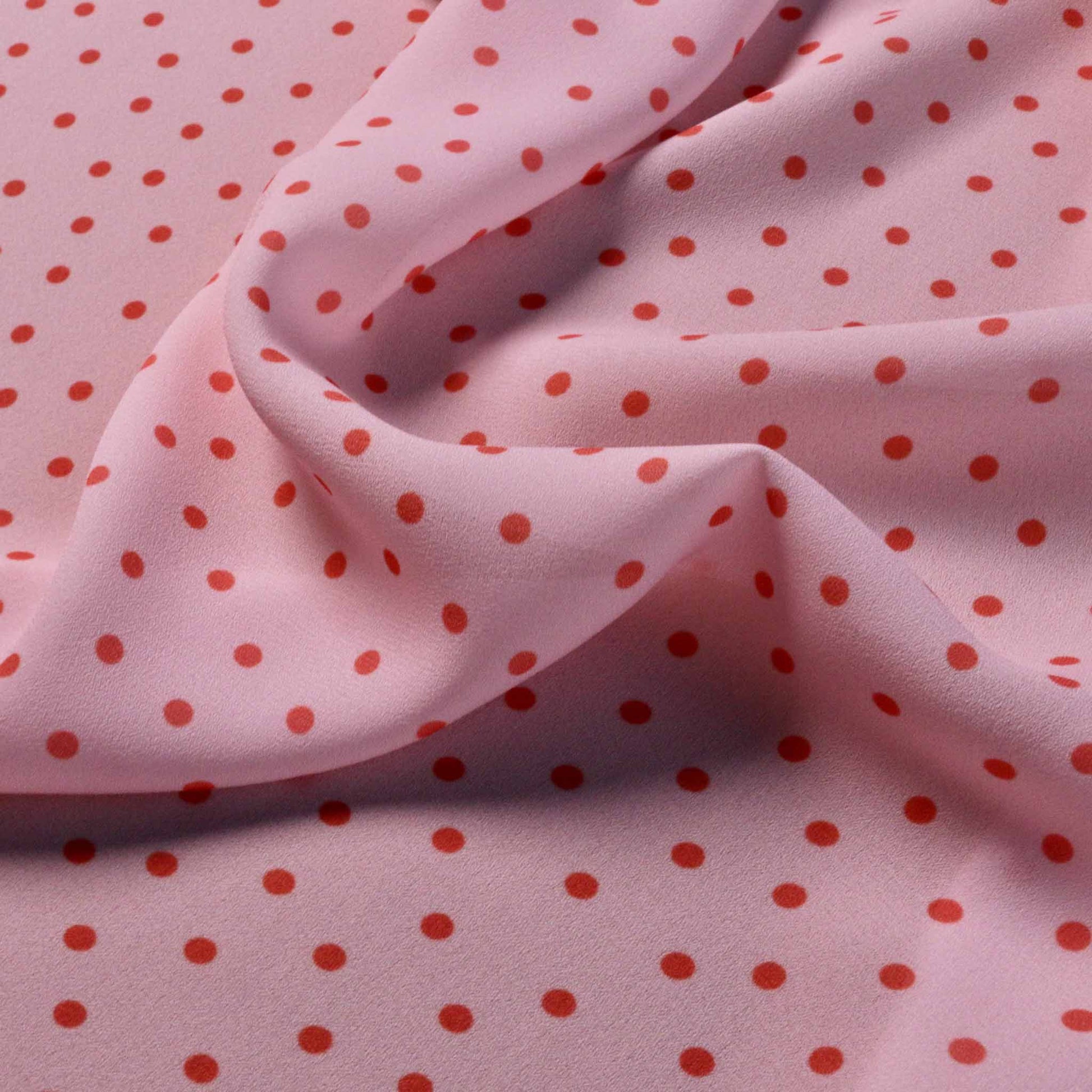 pink with pink polka dots georgette dressmaking fabric