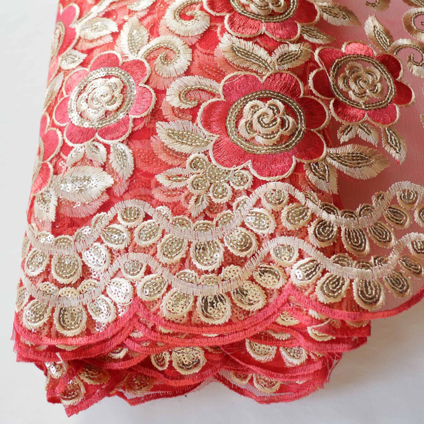 gold elegant embroidery on red lace dressmaking Indian inspired fabric