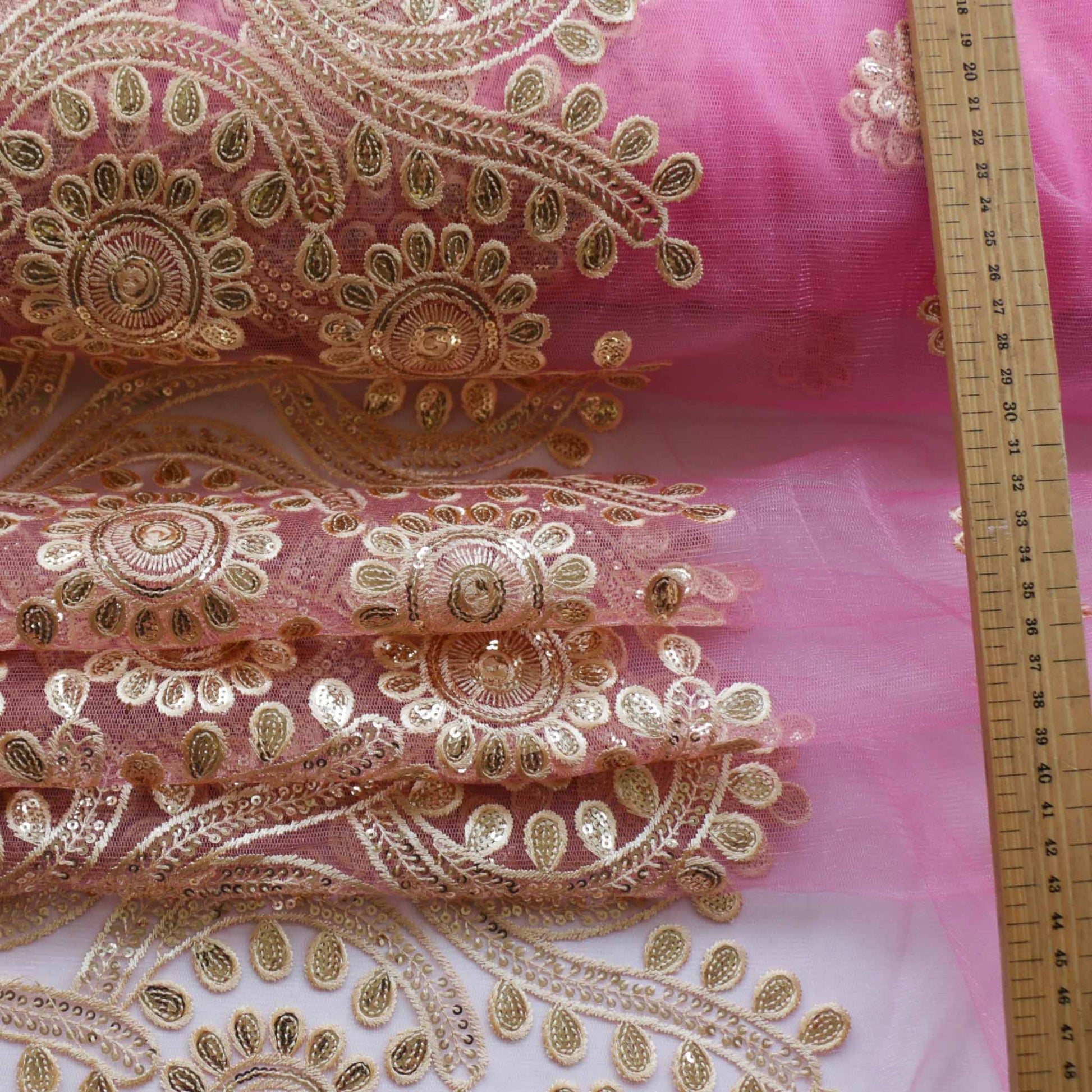pink tulle Indian dressmaking fabric with gold embroidery and sequins