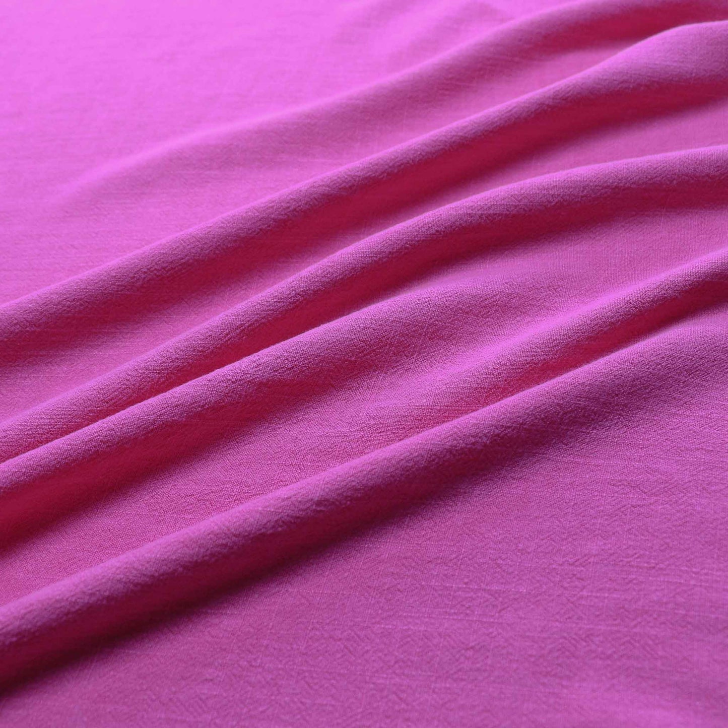 linen viscose dressmaking fabric in plain pink colour