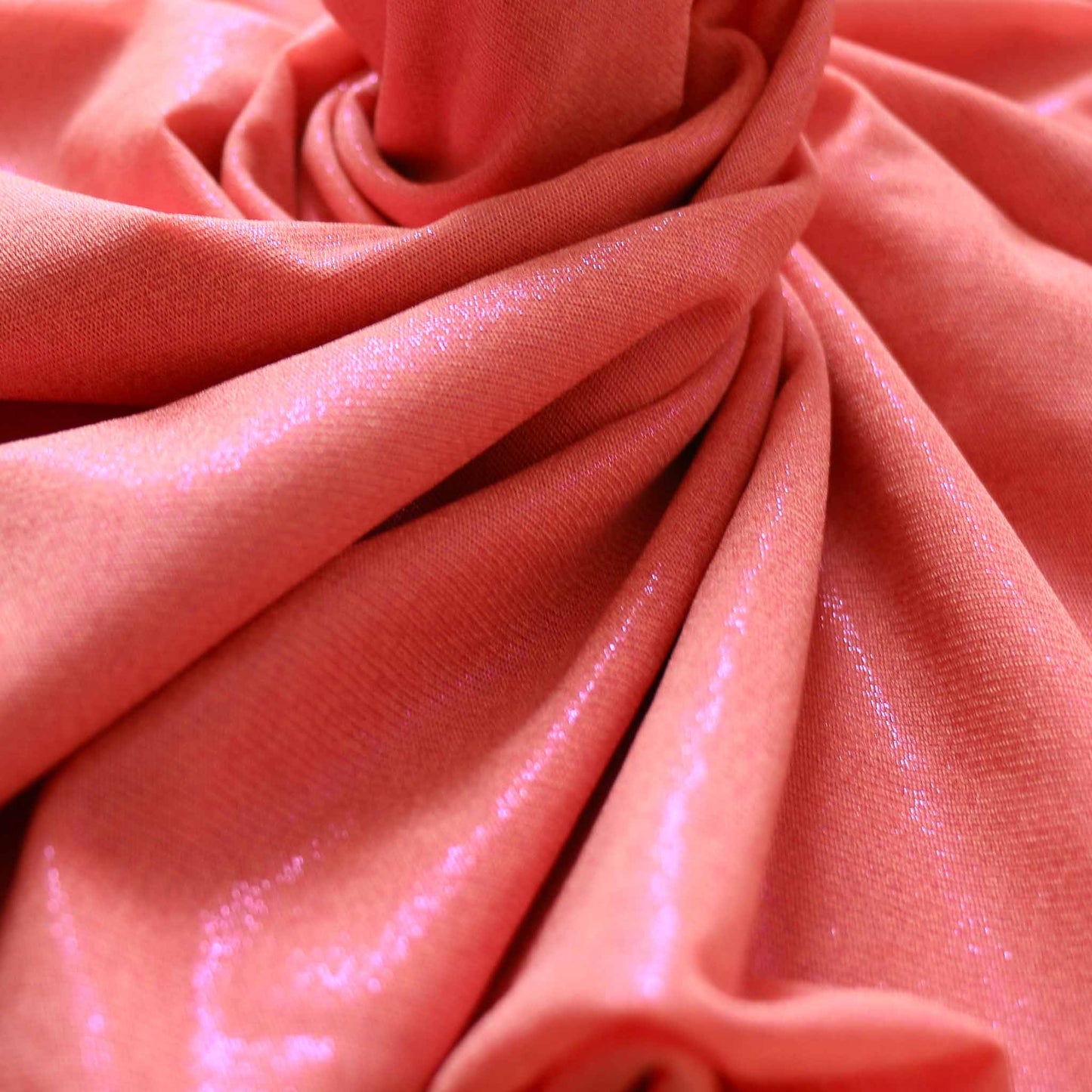 pink shimmer netting mesh dressmaking fabric