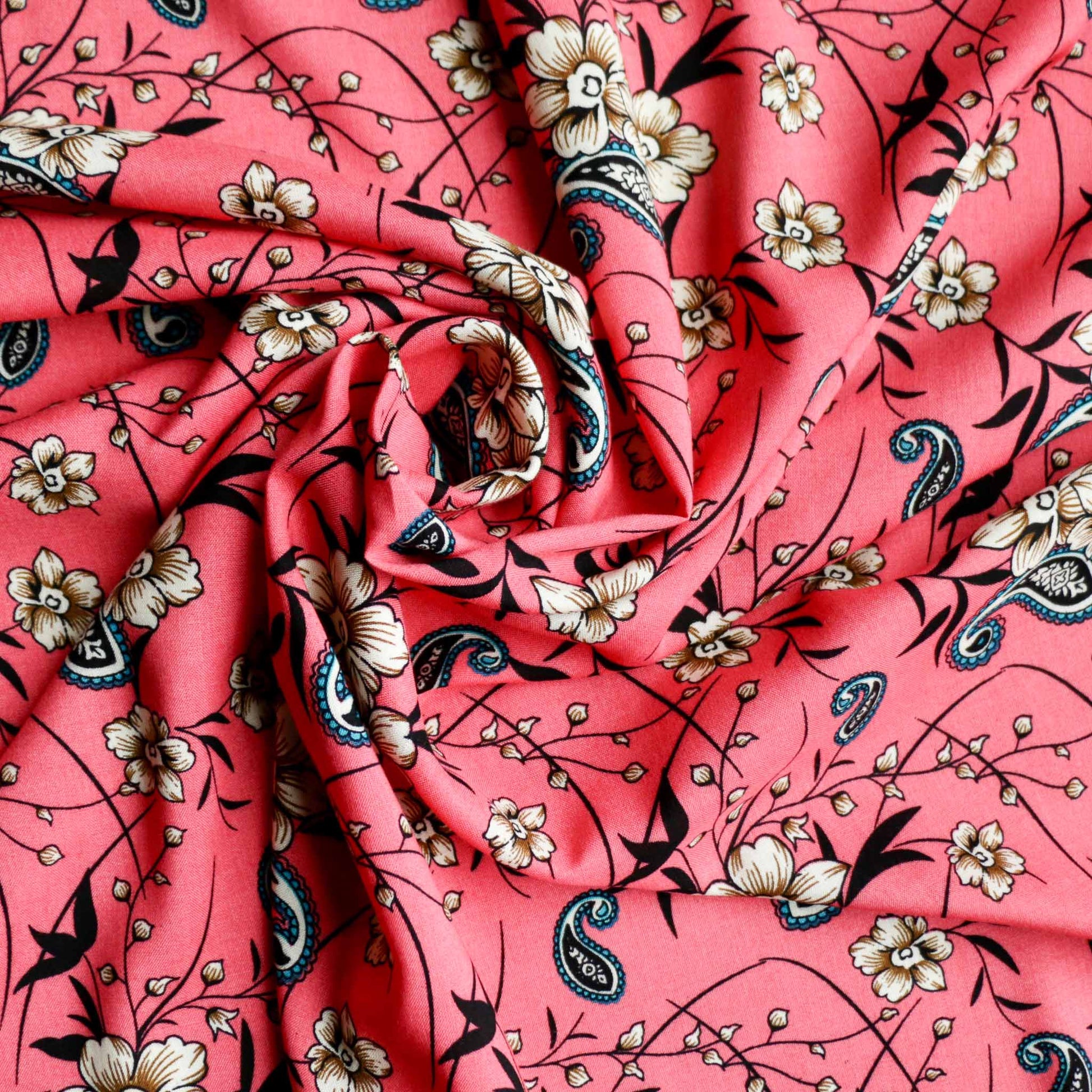 pink paisley inspired viscose challis dressmaking rayon fabric with floral design