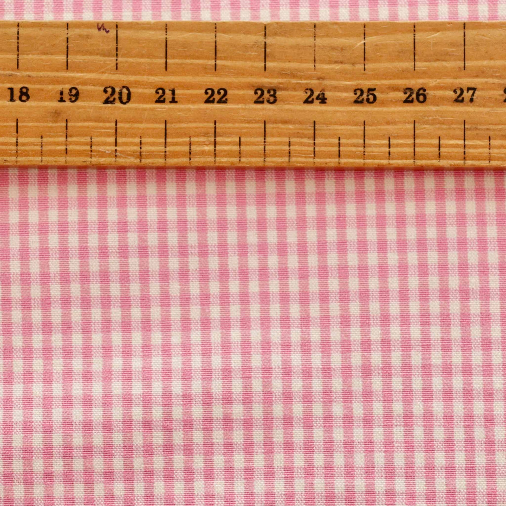metre pink and white bengaline dressmaking fabric with gingham check pattern