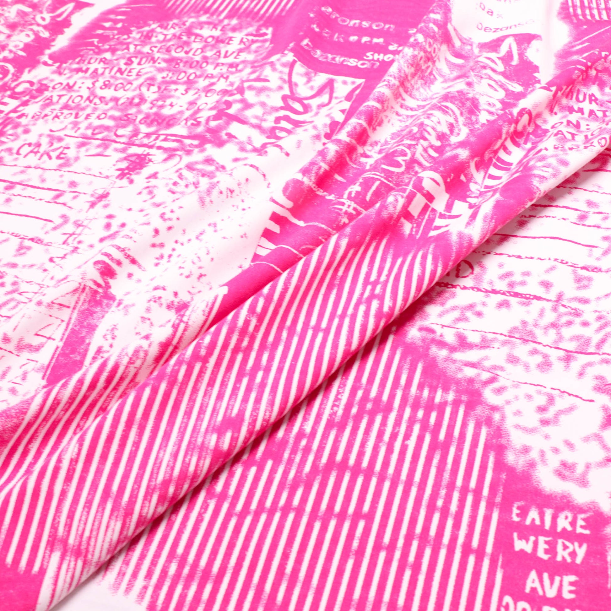 cotton sateen dressmaking fabric with pink and white punky print