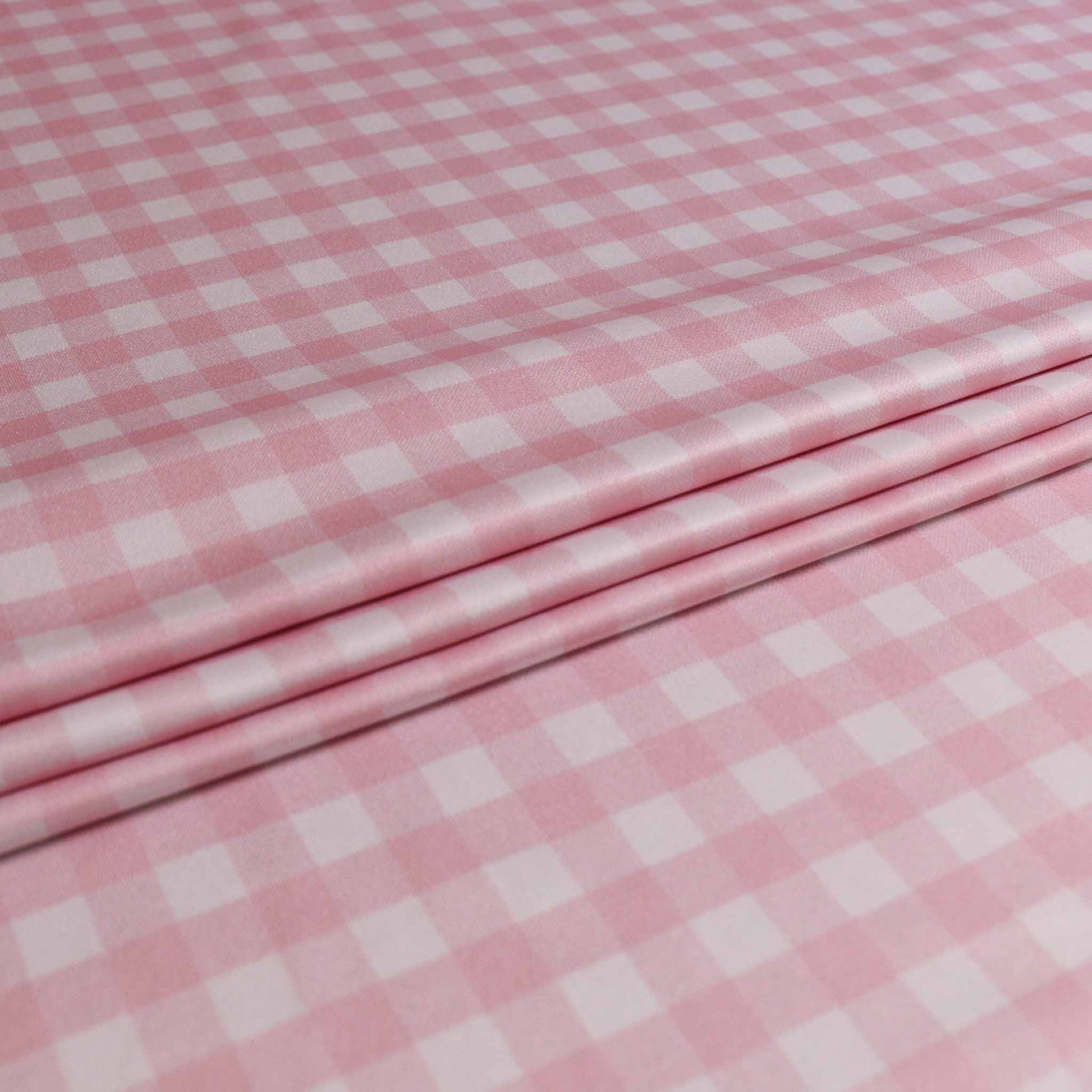 pink and white jersey lycra gingham dressmaking fabric