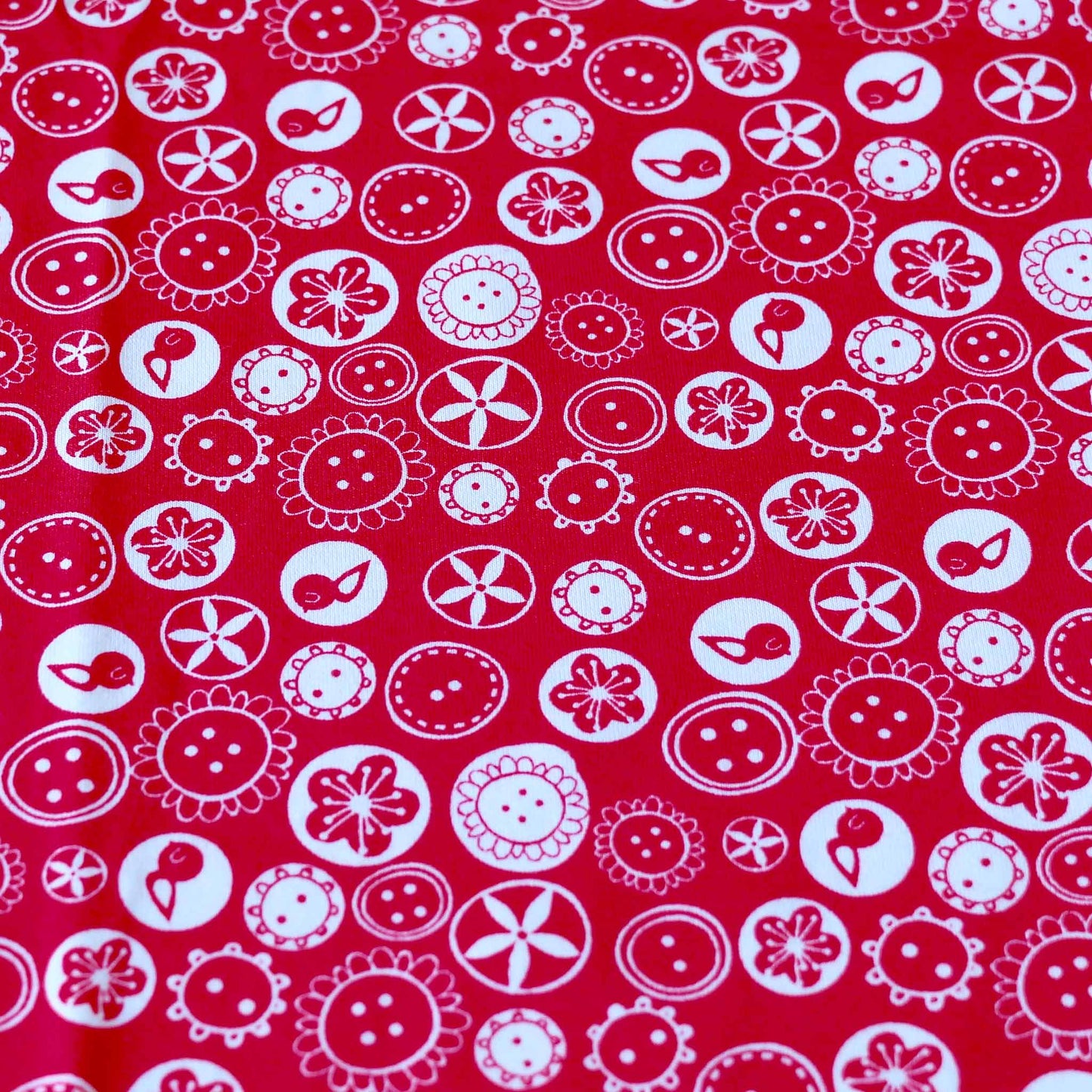 deadstock jersey cotton dressmaking fabric in pink with birds and floral print