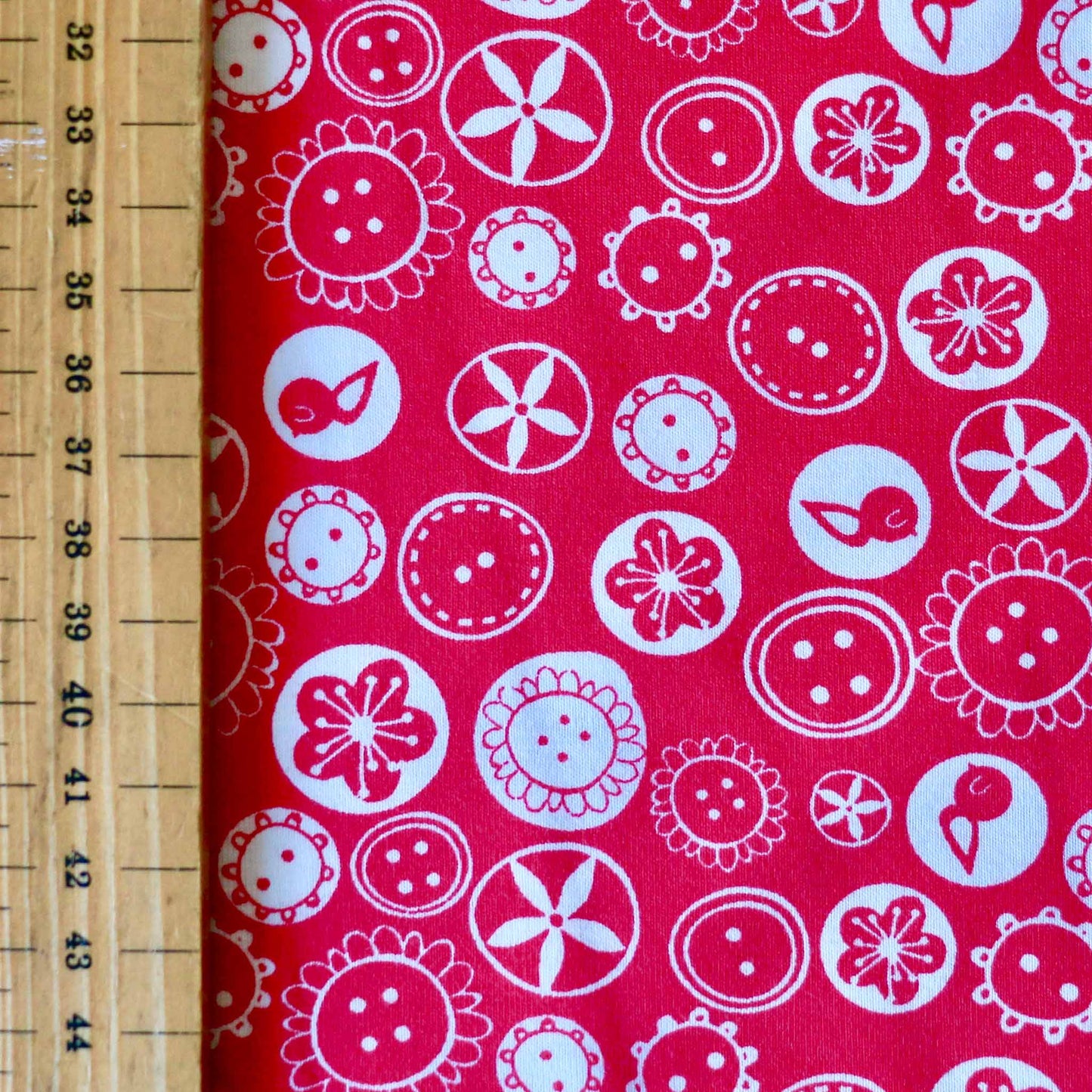 metre deadstock jersey cotton dressmaking fabric with white birds and flower print on pink colour
