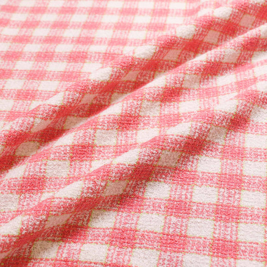 pink wool blend boucle dressmaking fabric with check pattern