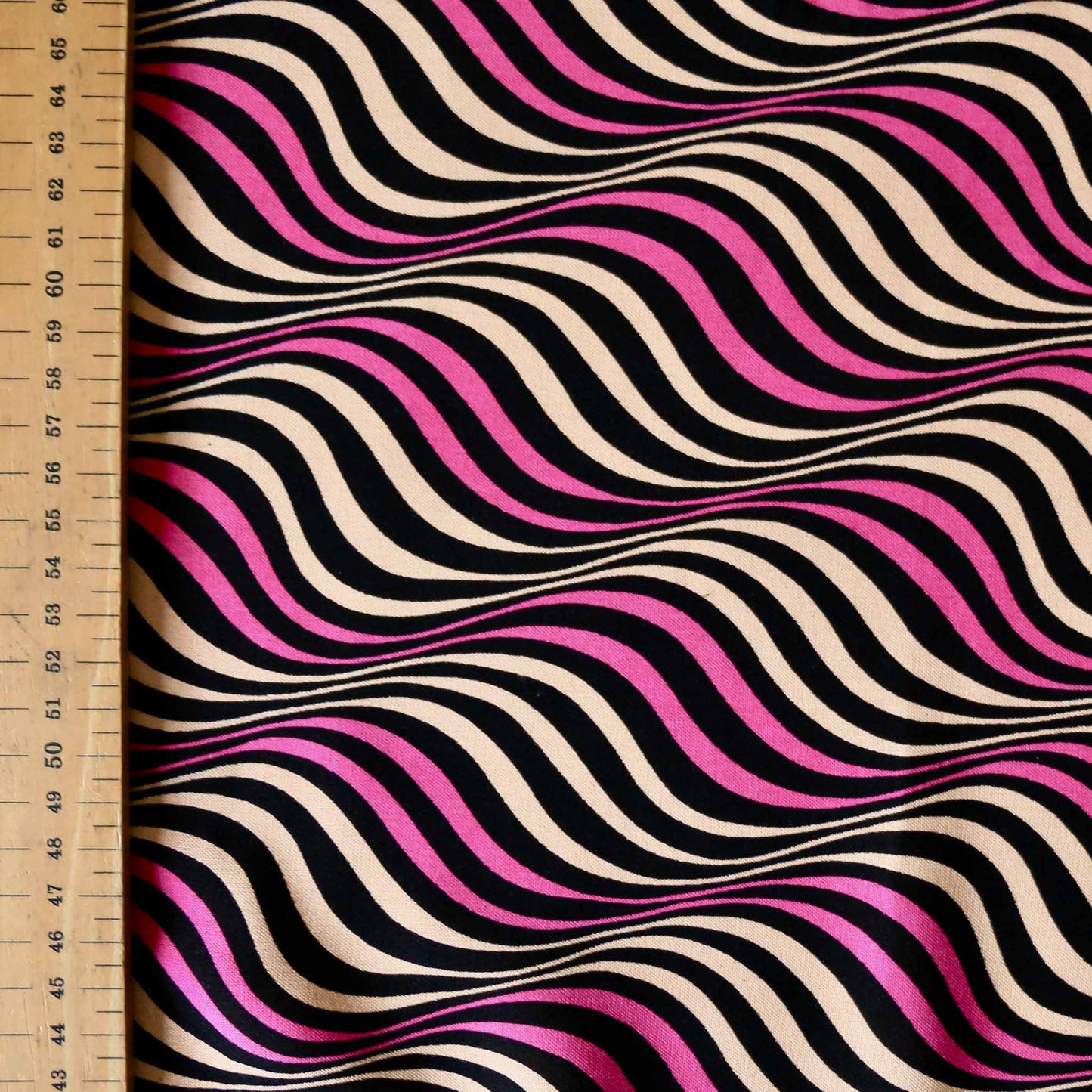 metre black beige and purple viscose challis dressmaking rayon fabric with wavey stripe design