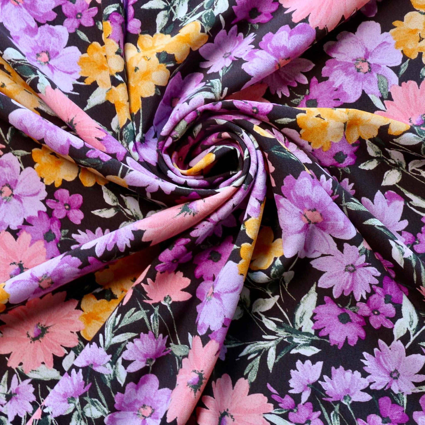 purple and lilac crepe de chine dressmaking fabric with floral print