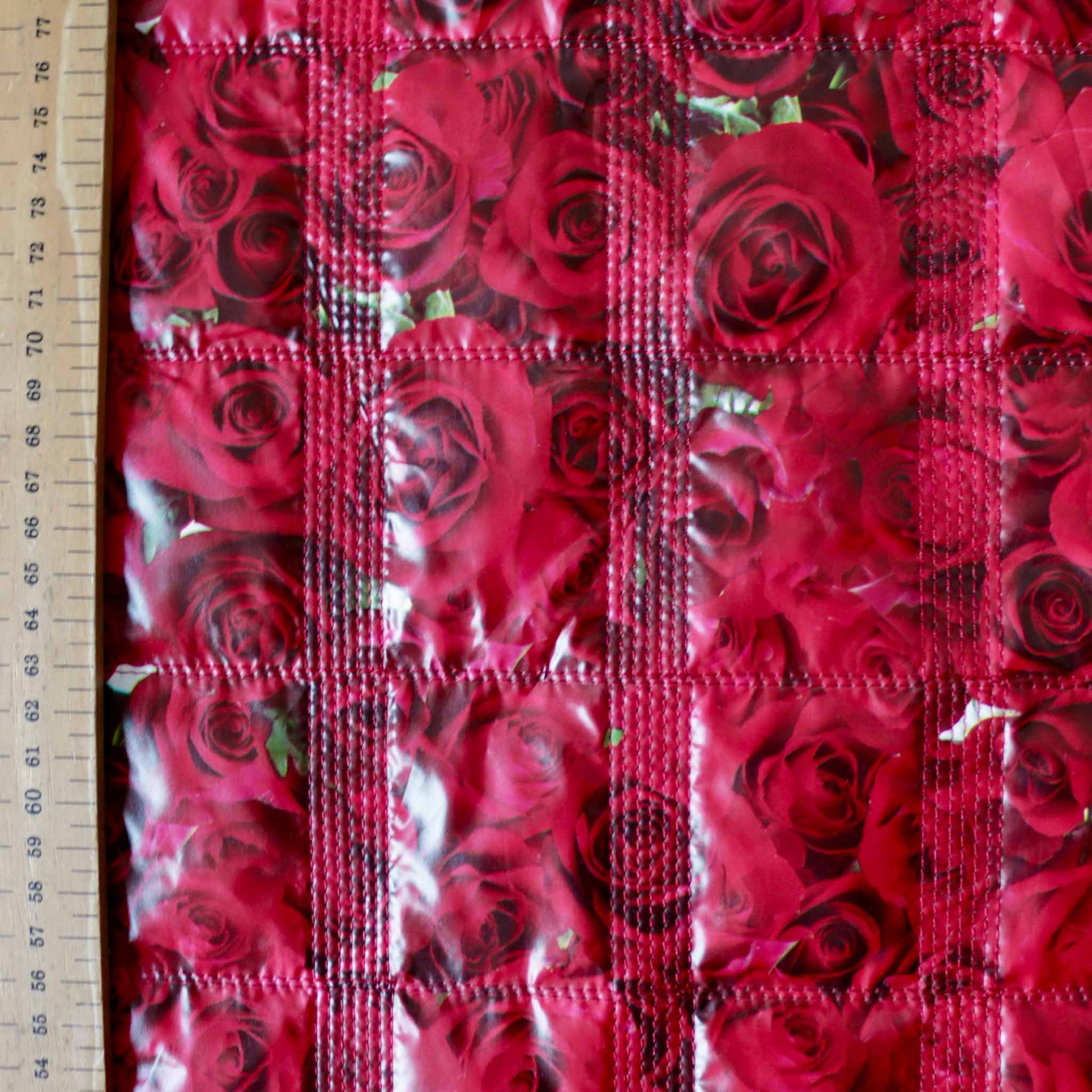 metre red quilting wadding dressmaking fabric with large floral rose flower print